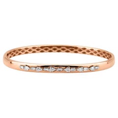 Bracelet jonc en or rose et diamants mélangés 0,52 carat