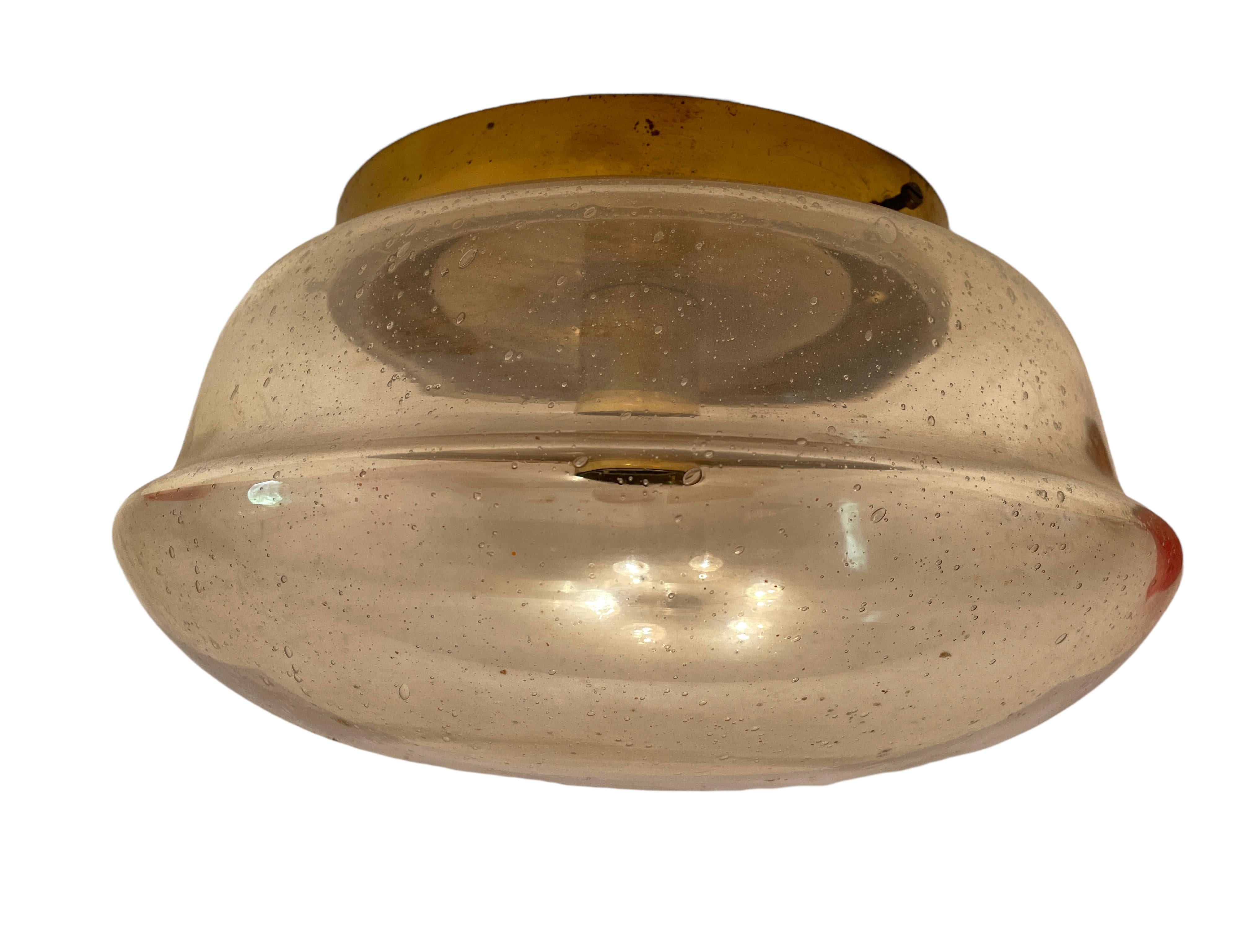A gorgeous metal flush mount by Hillebrand. Nice smoked amber glass. The flush mount requires one European E27 Edison bulb, up to 75 watts. A nice addition to any room.