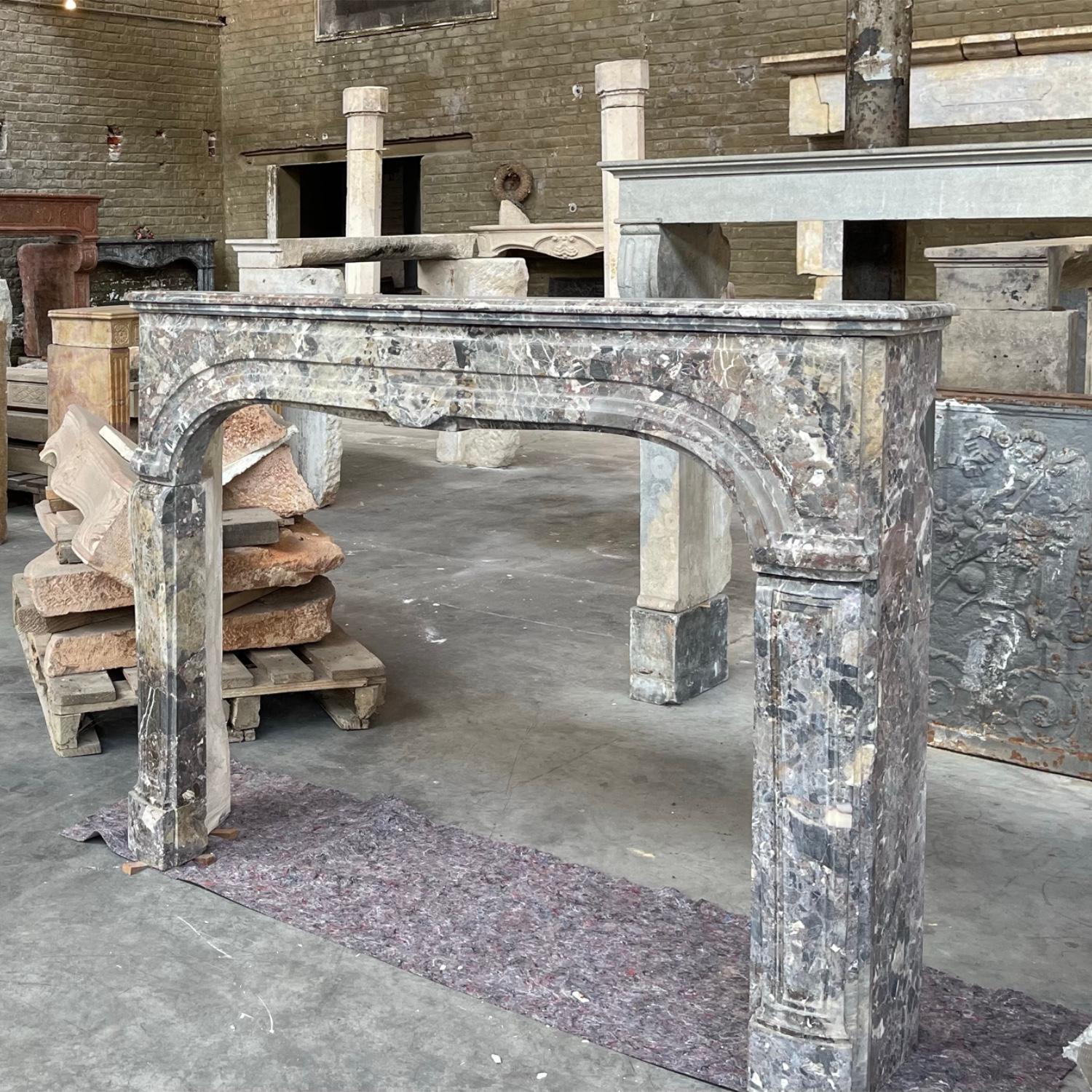 Louis XIV Petite and Fine European Antique Fireplace Surround for Timeless Interior For Sale