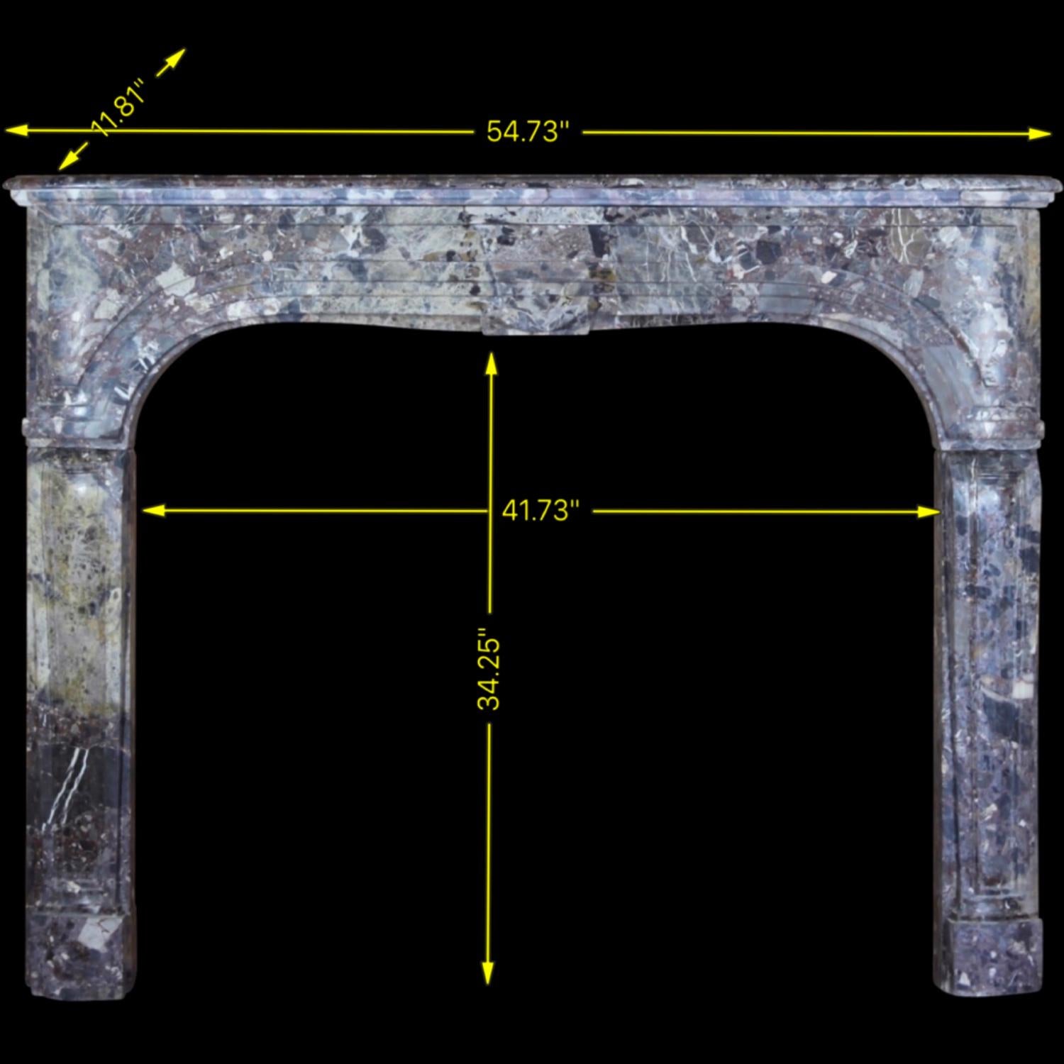 This one of a kind antique Belgian reclaimed fireplace mantle is made in a Royal Grey Brêche marble. It is perfect for a small room.
A rare Louis XIV Style of the 19th century in great condition which fits perfectly in a high end timely,