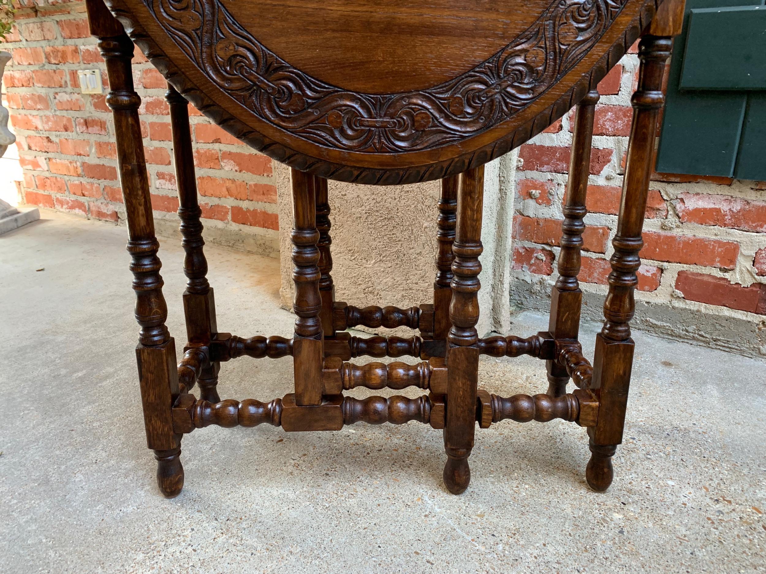 Early 20th Century Petite Antique English Oak Side Sofa Wine Table Drop-Leaf Gate Leg Carved Oval