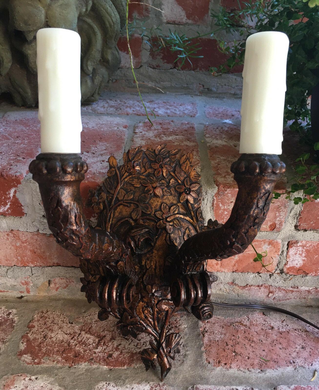 ~ Direct from France
~ A hand carved wood sconce with beautiful floral details. The entire base is a bouquet of flowers with delicate stems at the very bottom!
The two arms are also faux bois and floral; I’ve not seen another one like this!
~