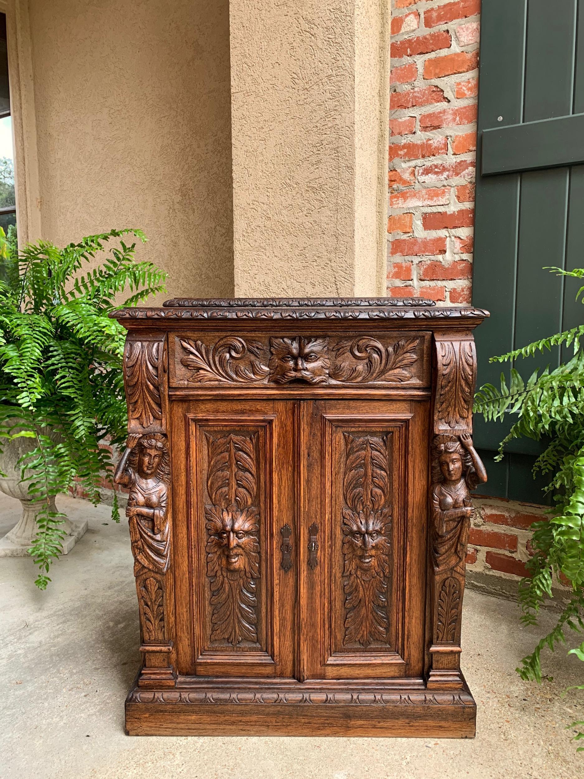 Petite antique French carved oak cabinet server table renaissance server lion

~Direct from France~
~Outstanding carvings throughout this beautiful cabinet, presented in a versatile smaller size, perfect for just about any room!~
~Cabinet top