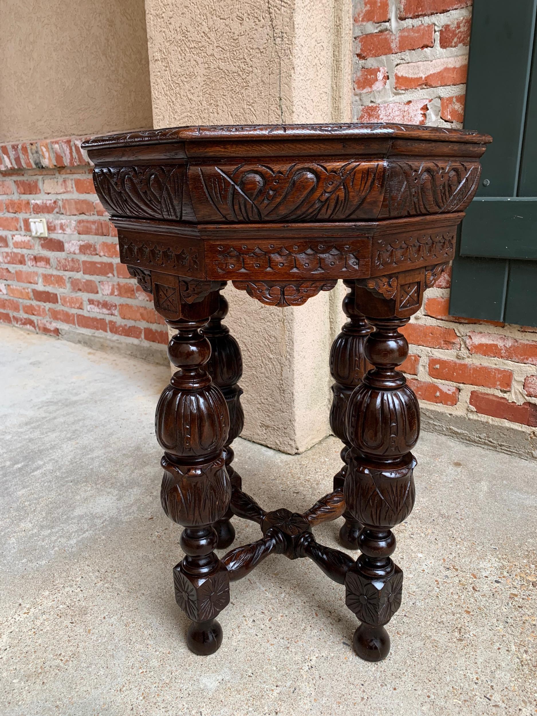 Petite antique French carved oak octagon center table side end Renaissance
 
~Direct from France~
~Super petite size, very rare, but ornately adorned, just like the full size version, with an impressive Silhouette and commanding design!~
~Thick,