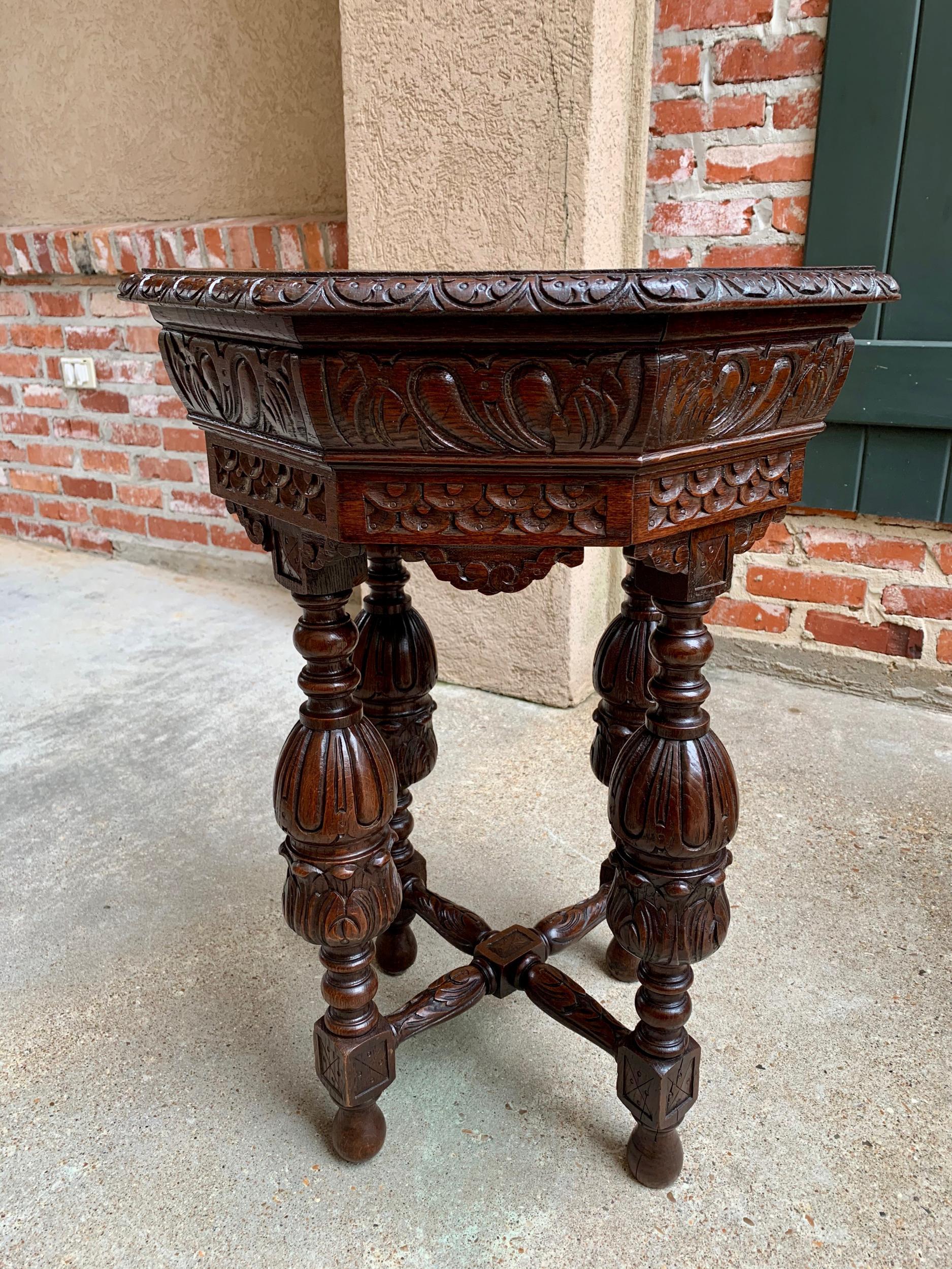 Petite antique French carved oak octagon center table side end renaissance

~ Direct from France
~ Super petite size, very rare, but ornately adorned, just like the full size version, with an impressive silhouette and commanding design!
~ Thick,