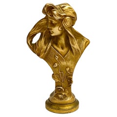 Petit buste ancien en bronze doré de style Art nouveau représentant une jeune femme, signé Hans Muller