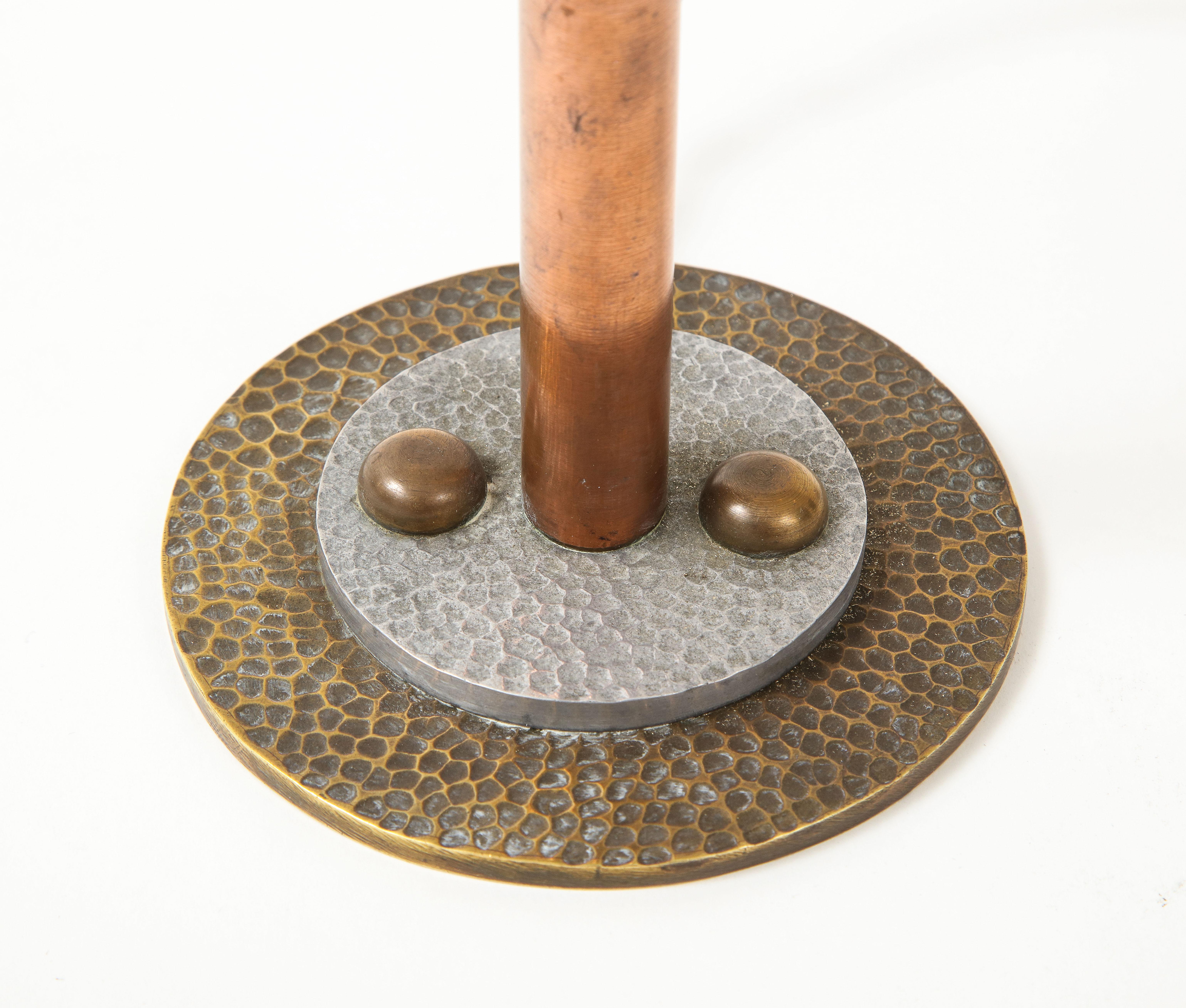 Elegant petite table or desk lamp
Art Nouveau period
unusual hammered brass details
new rewiring.