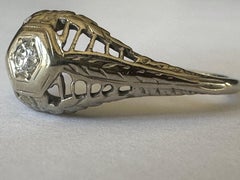 Petite Art Deco Diamond Solitaire and Filigree Engagement Ring