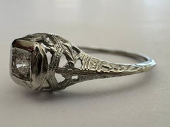Petite Art Deco Diamond Solitaire and Filigree Engagement Ring