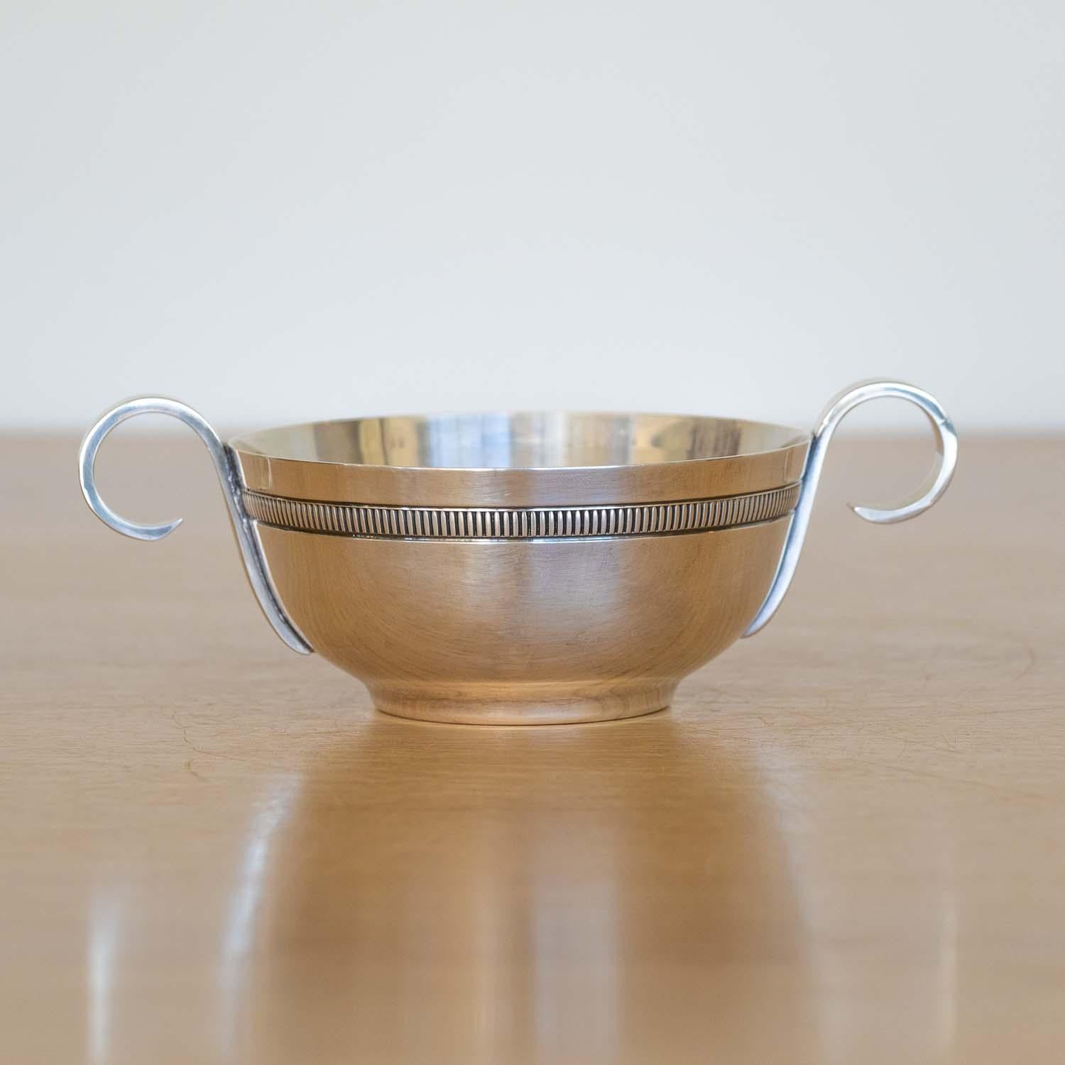 Beautiful petite silver bowl from France, 1930's. Stunning Art Deco piece with loop handle detail. Original finish shows great age and patina. Perfect as a decorative object or catchall. Stamped on underside.