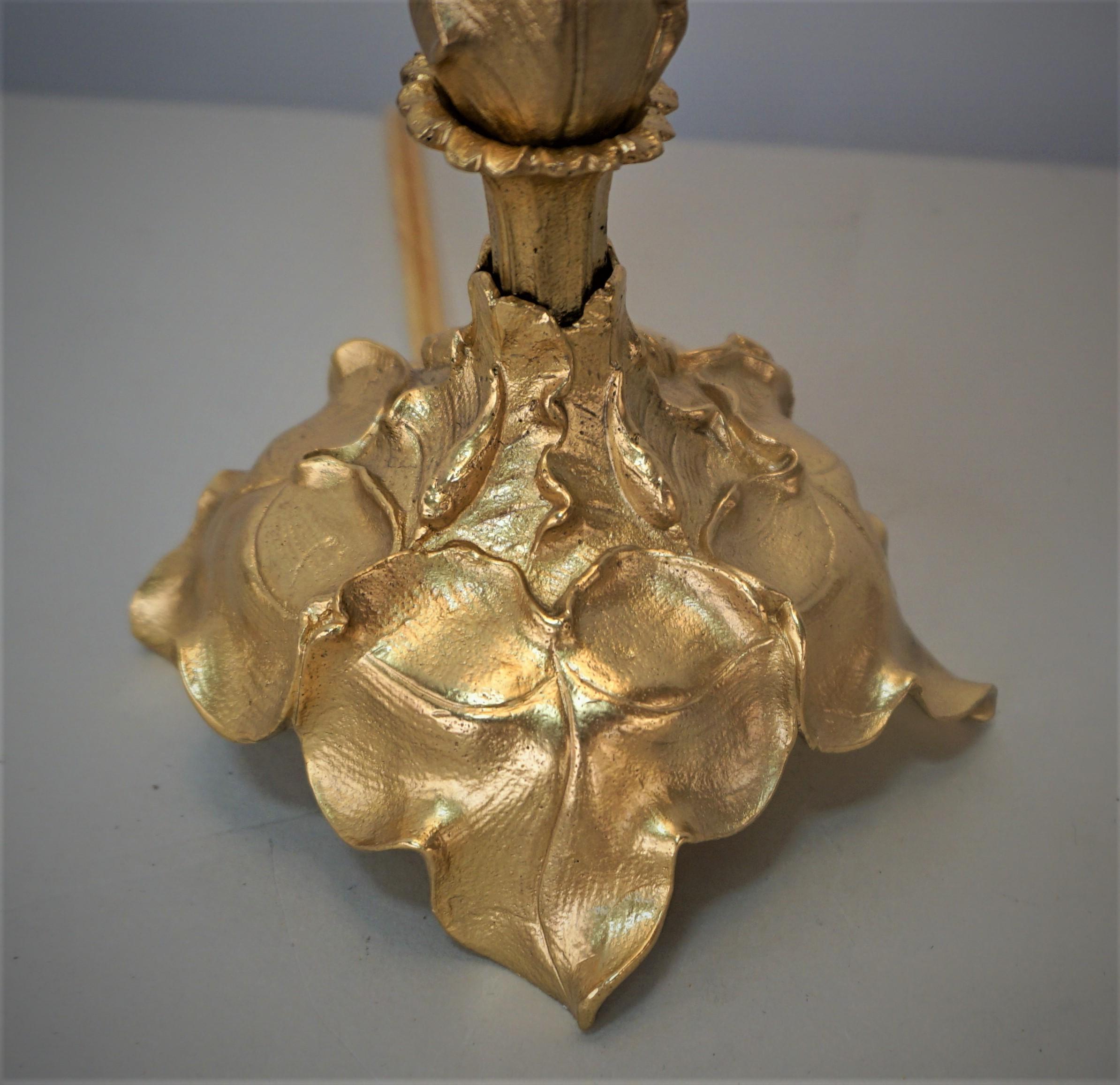 Dore bronze candlestick lamp that has been wired as a table lamp.