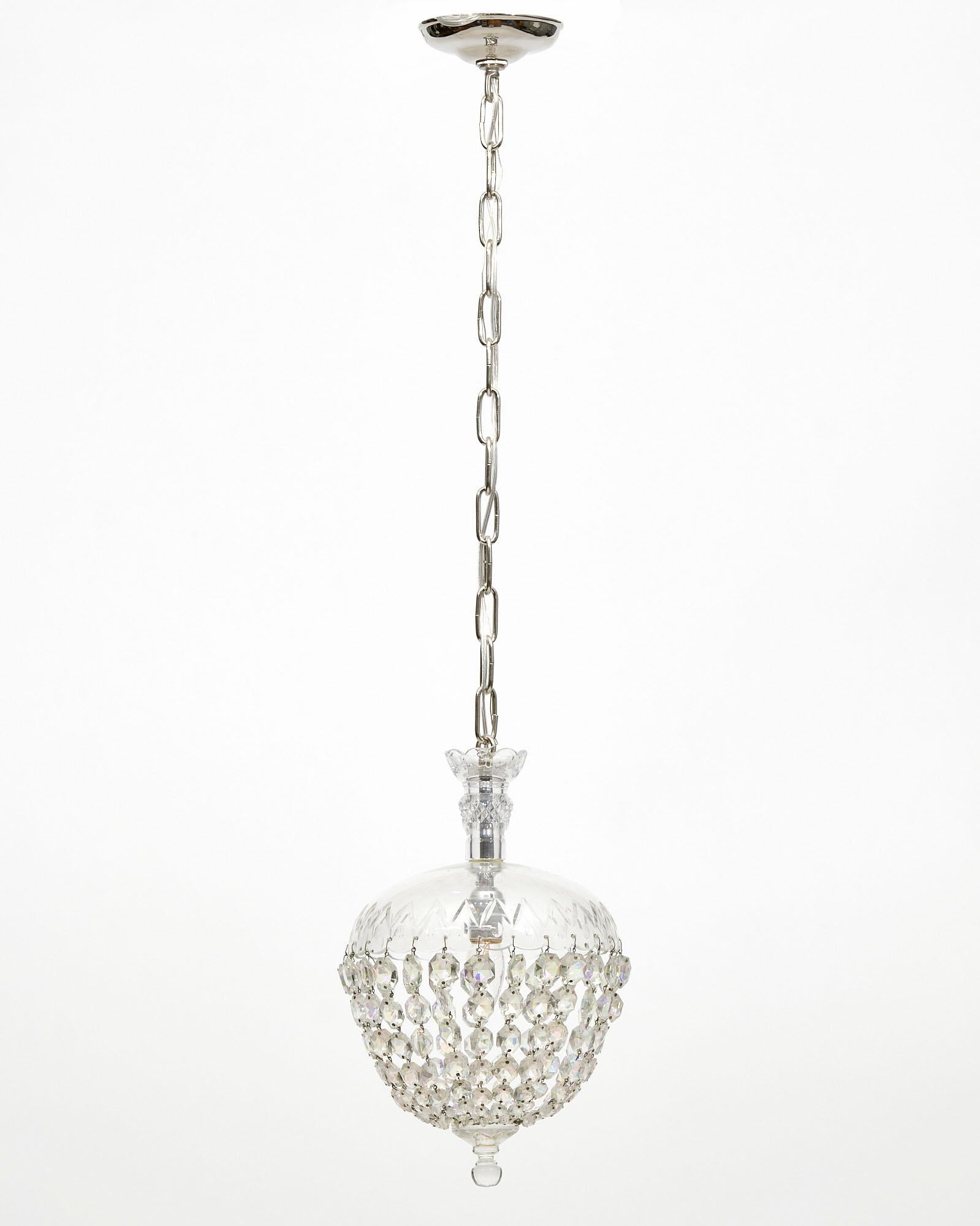 Chandelier from France made of crystal in the typical bell shape by Baccarat. This piece has been newly wired to fit US standards.
Measure: The current height from ceiling is 43