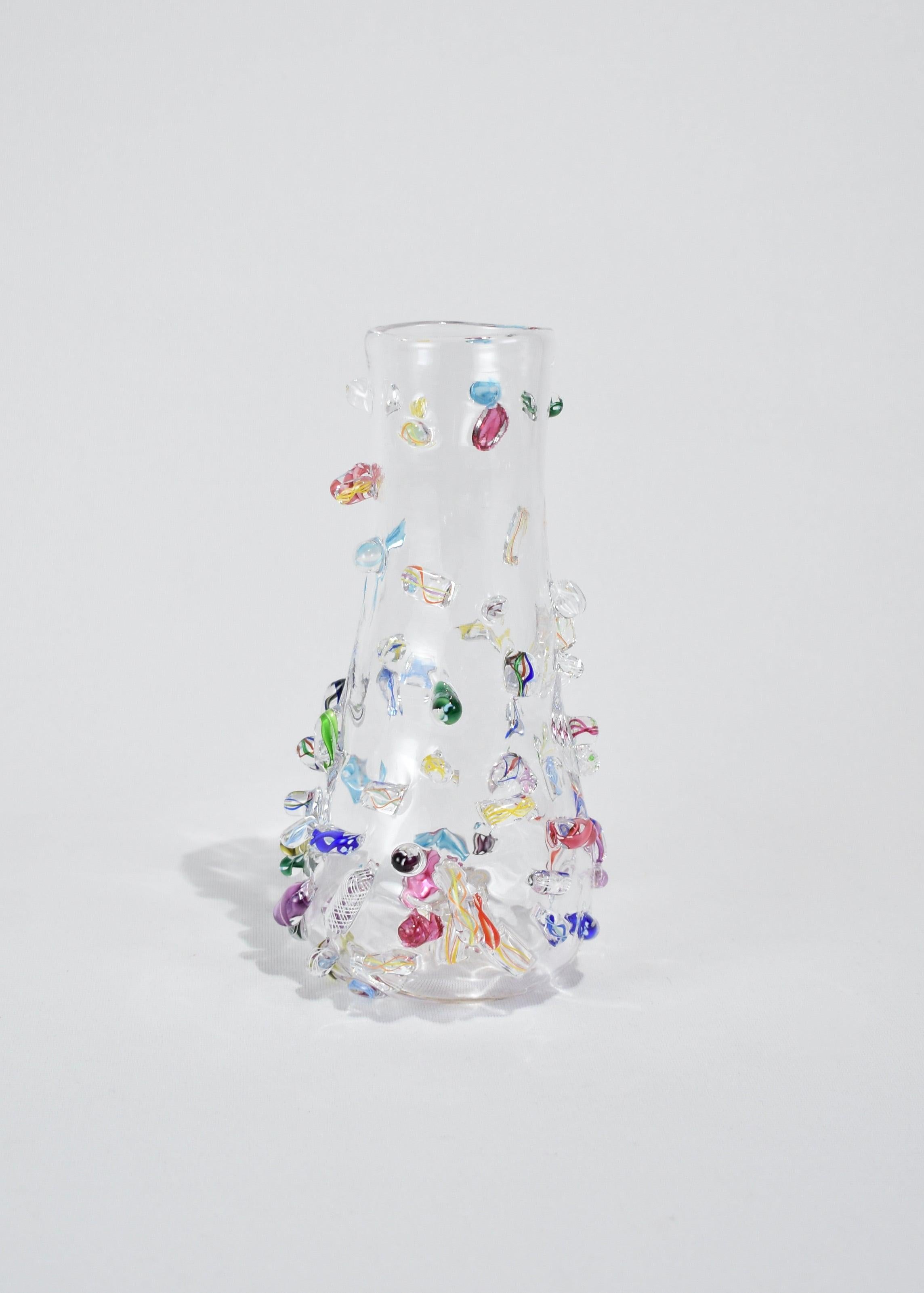 Blown glass stem vase with applied decoration. Handmade in USA by Lisa Stover. Exclusive to Casa Shop.

Please note: Due to the handmade nature, subtle variations in form and finish are to be expected.
Dimensions
Height: approximately 7 in