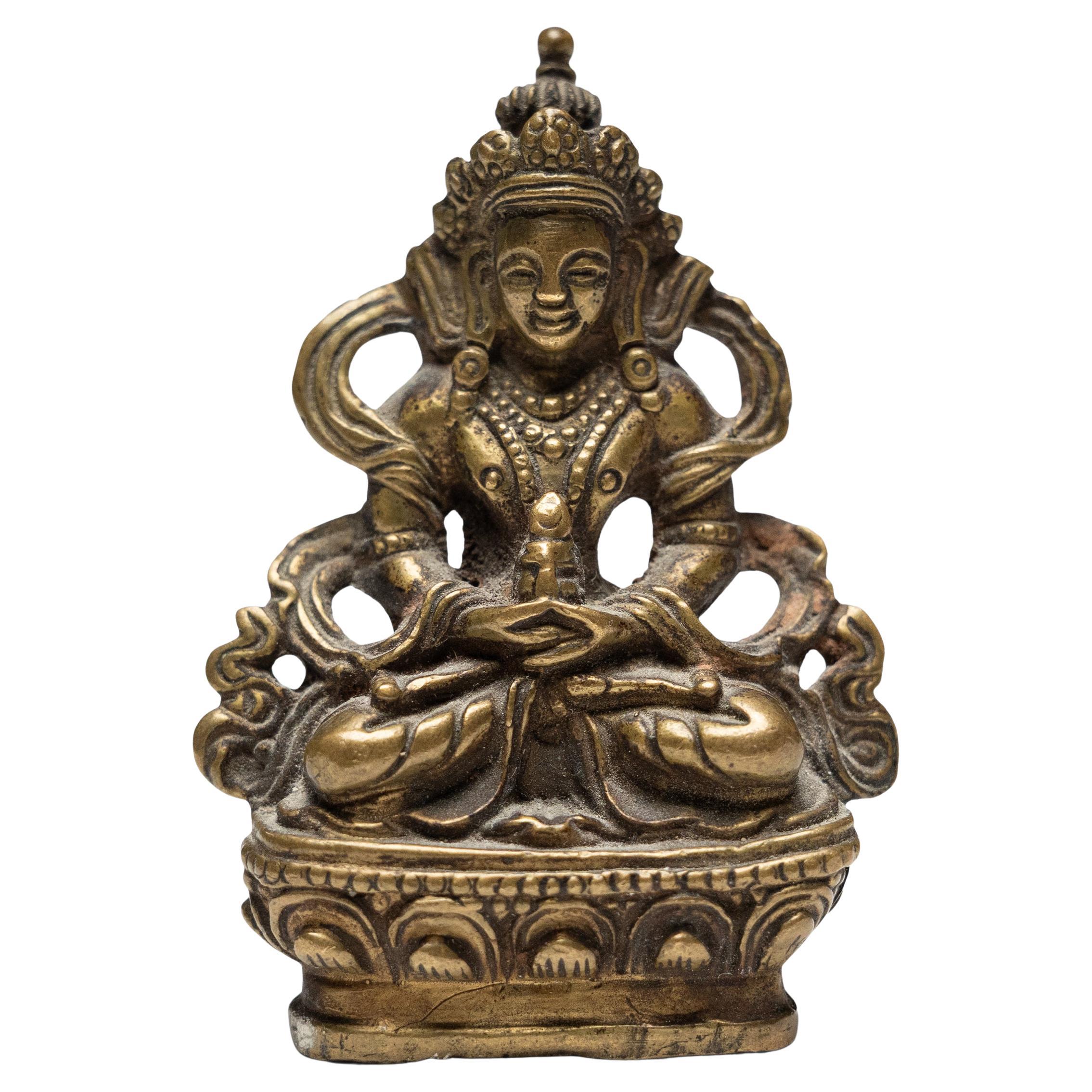 Kleines Messing-Amulett von Avalokiteshvara