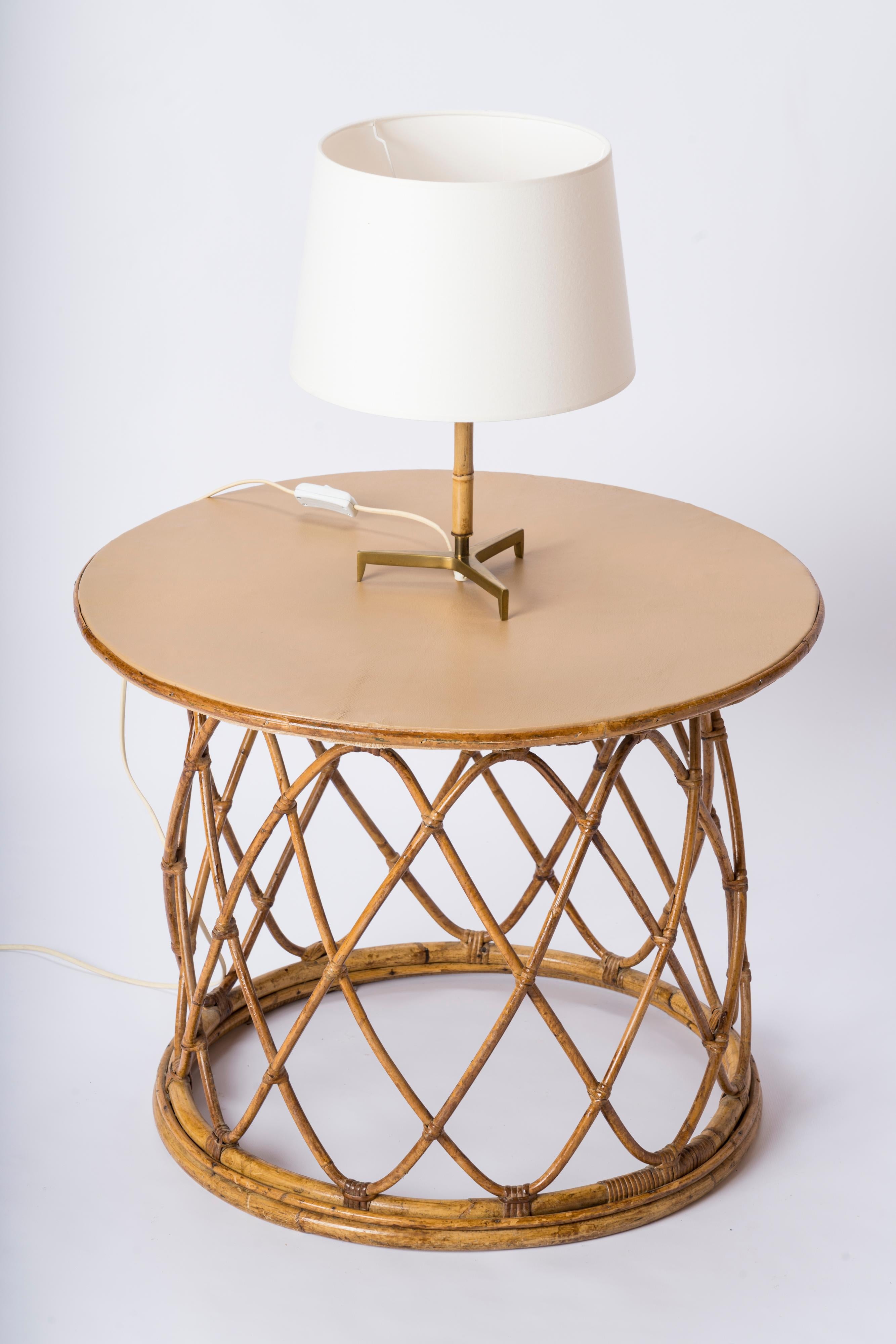 Small bamboo & bronze table lamp. Bronze star-shaped tripod base and waxed bamboo pole. European socket and wiring.
Shade for showing purposes only.
This lamp ships from France and can be returned to either France or to an upstate NY USA