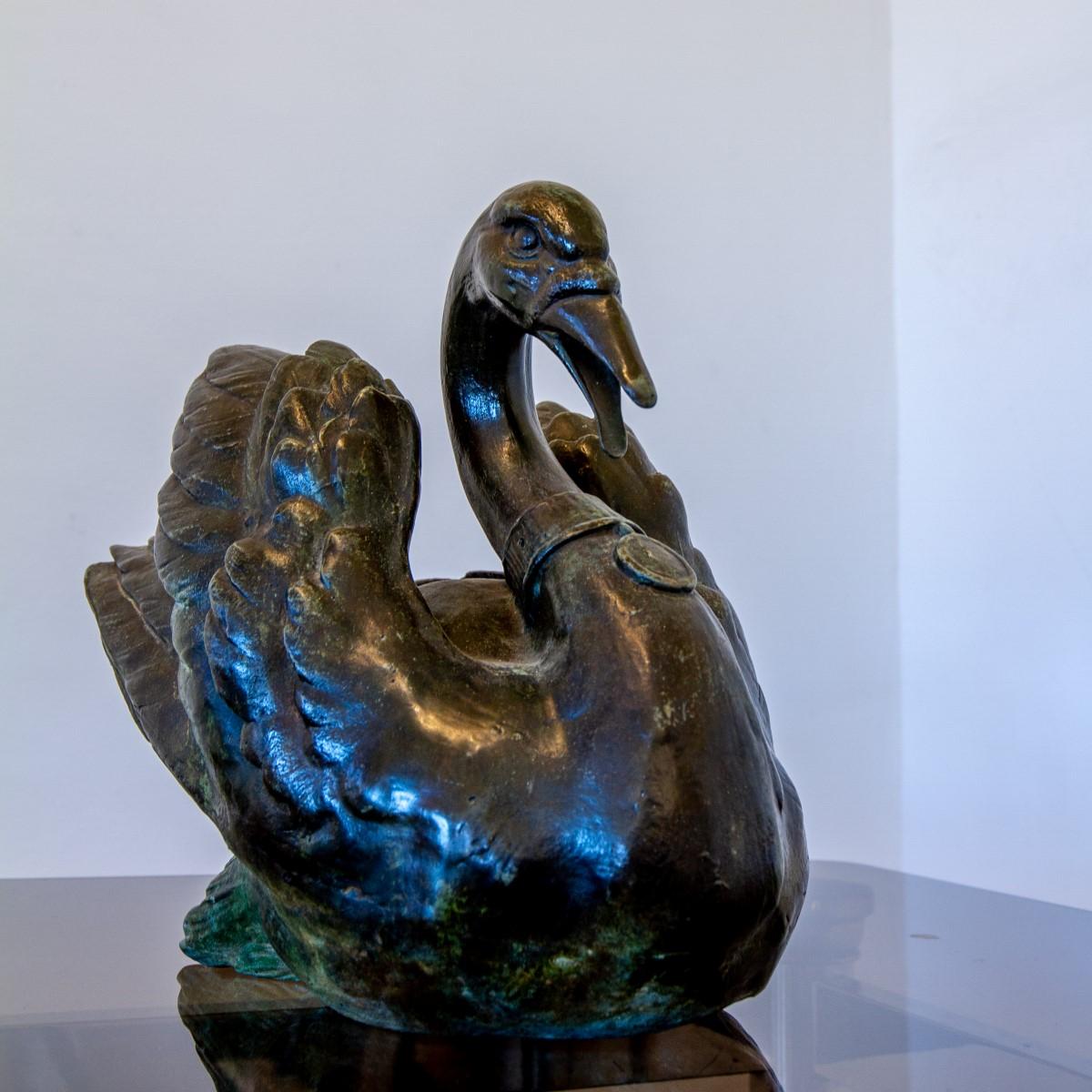 A unique bronze fountain of a swan, cast from a 19th century English fountain. The water can be plumbed to come out of its beak. Editioned 1/3.