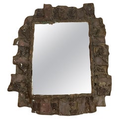 Petit miroir brutaliste en laiton