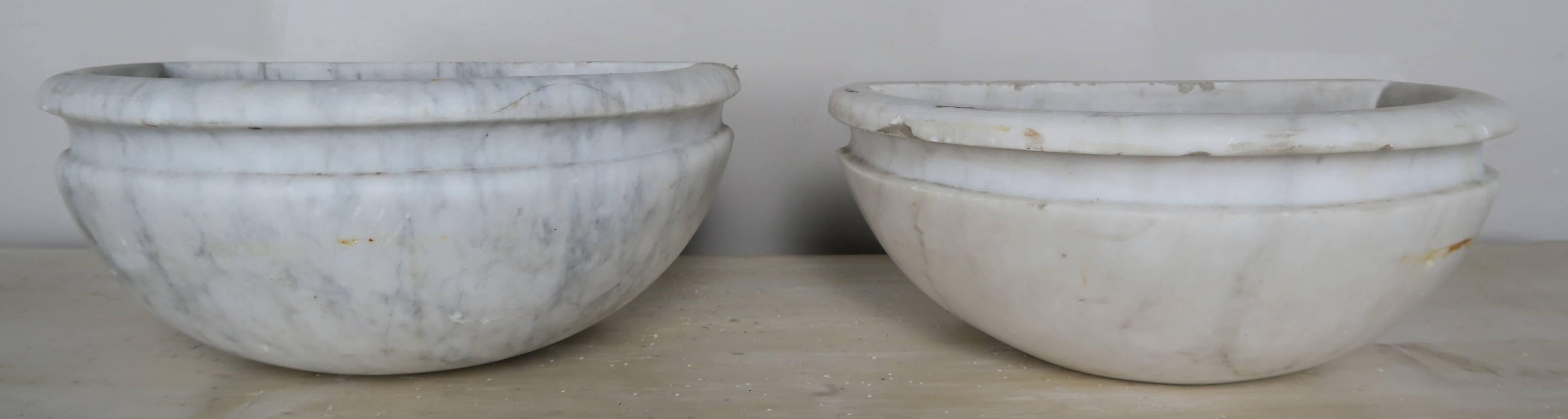 A pair of Italian Carrera marble basins that are perfect for the garden. The little birds in your yard will love you for it.