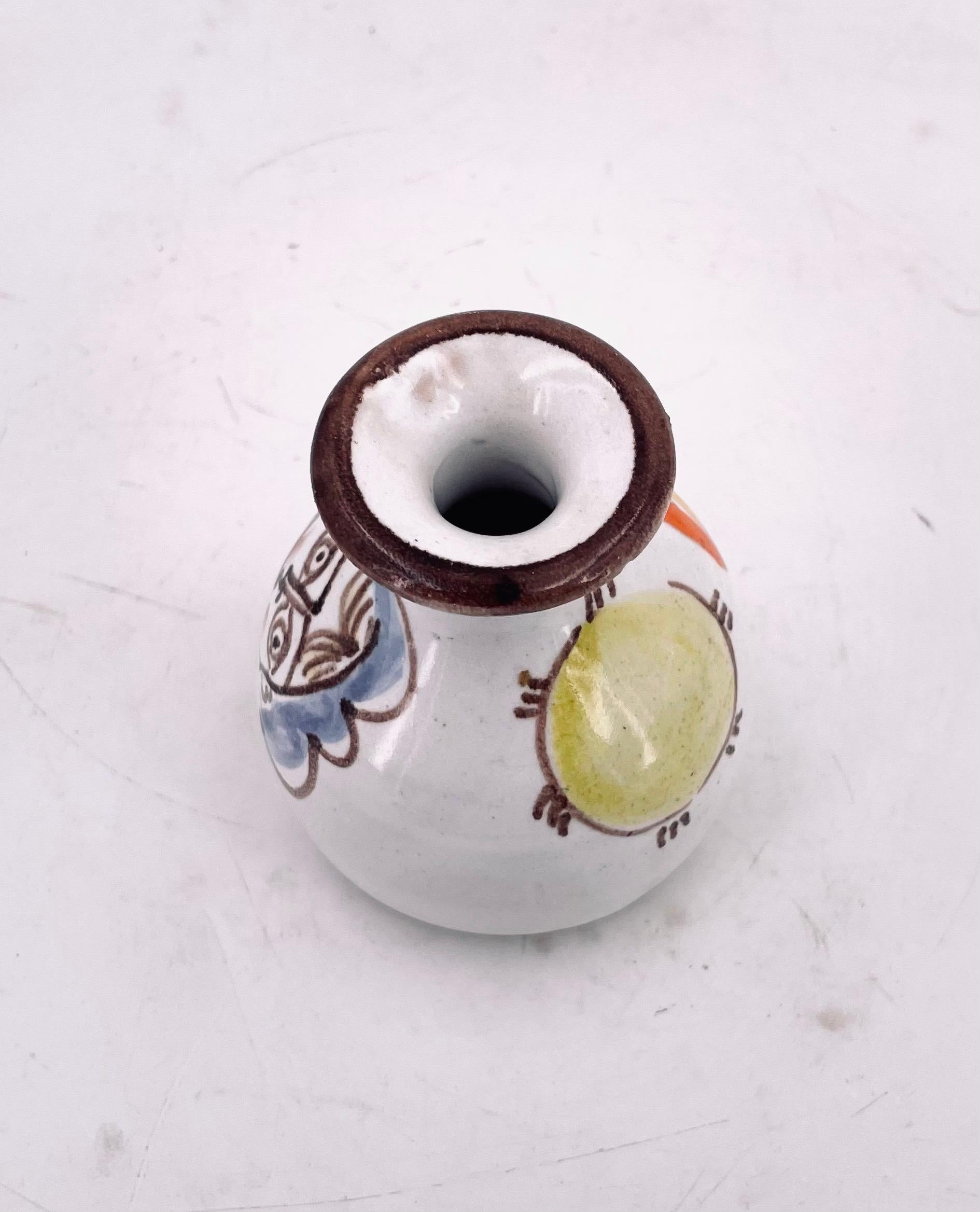 Beautiful ceramic small vase by famous artist DeSimone, hand-painted, circa the 1950s, made in Italy. Nice colors and great condition no chips or cracks. circa 1965.