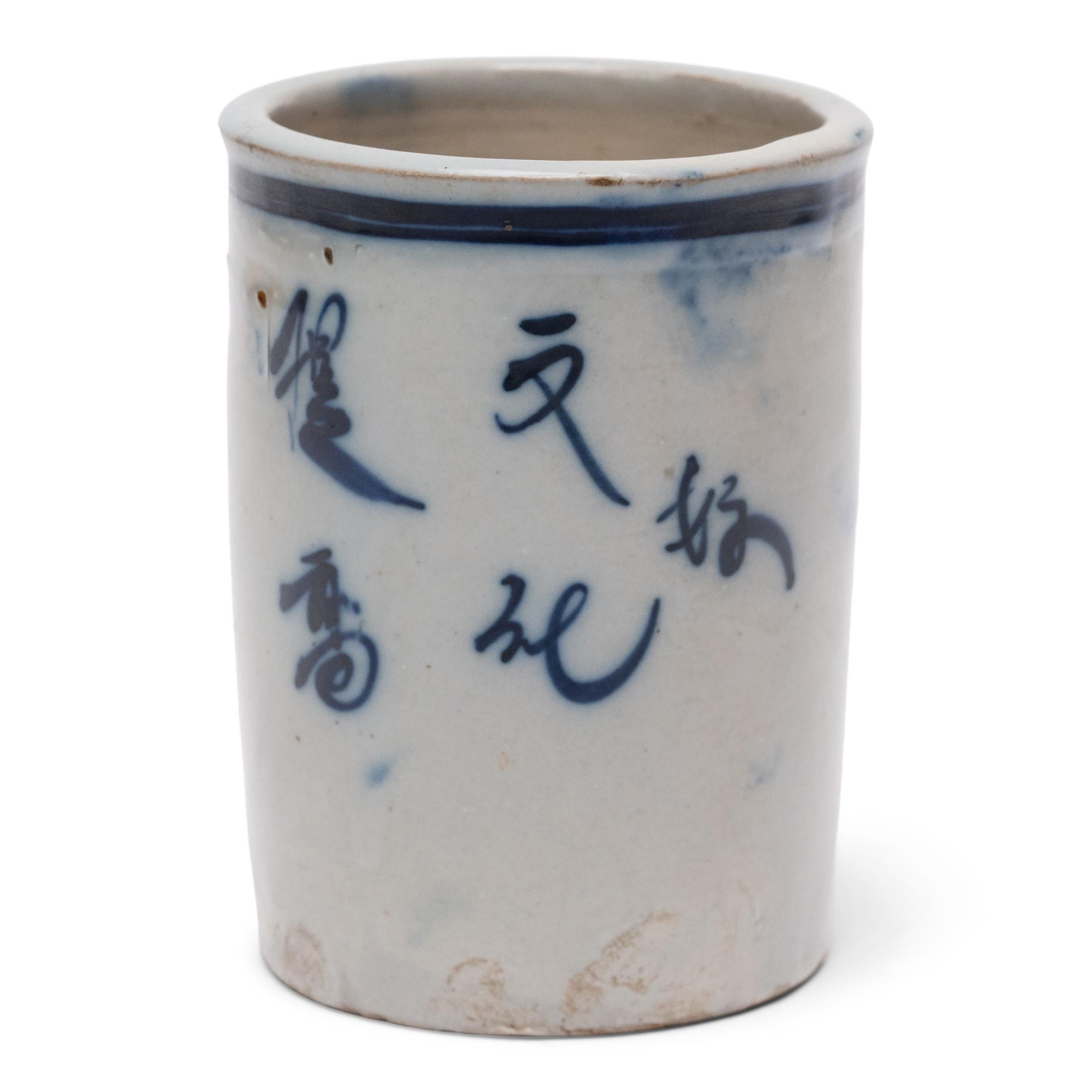 Set alongside the four treasures of the study - the calligraphy brush, ink, paper, and inkstone - a brush pot was a fixture of every traditional scholars' desk. This petite ceramic example dates to the late 19th century and is beautifully glazed in