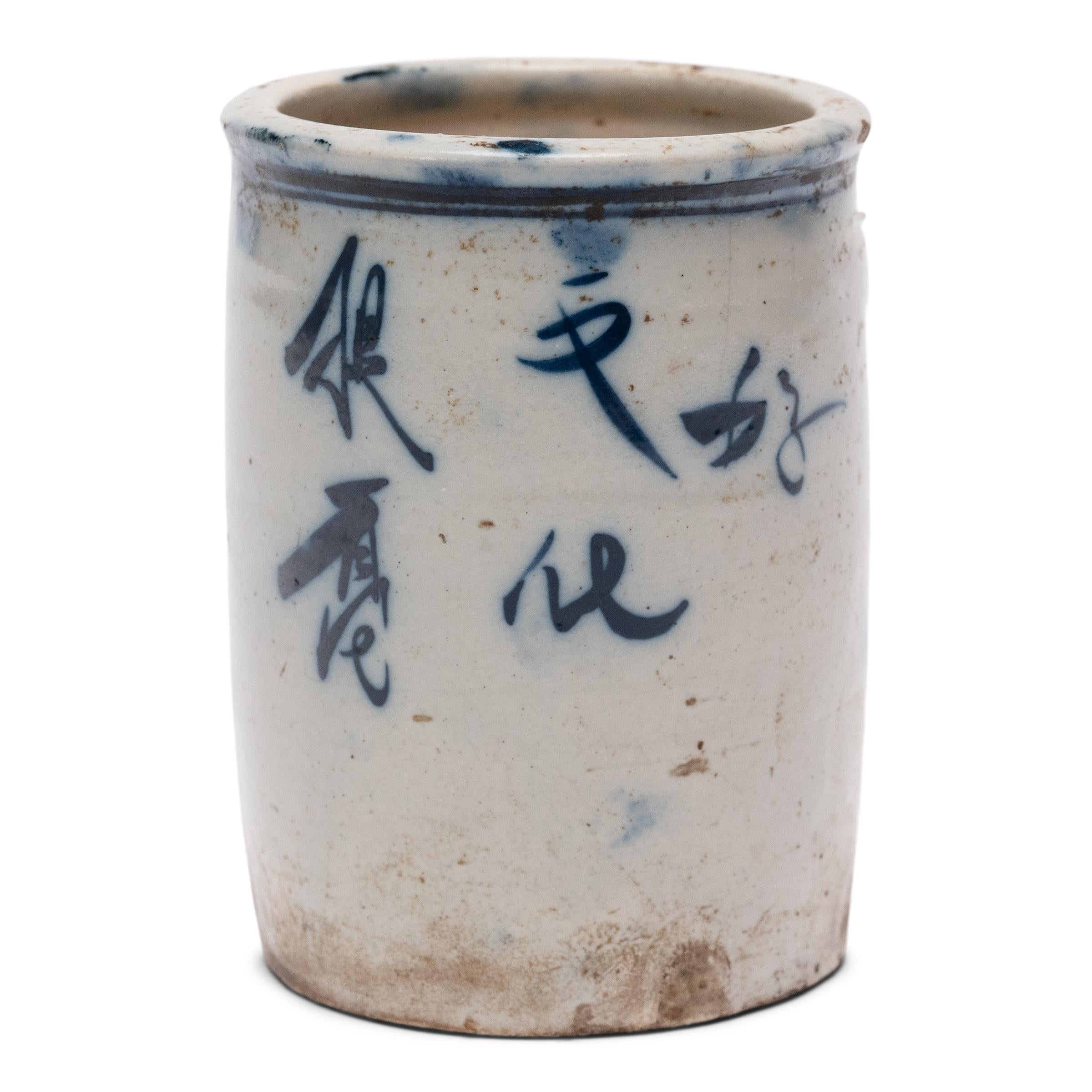 Set alongside the four treasures of the study - the calligraphy brush, ink, paper, and inkstone - a brush pot was a fixture of every traditional scholars' desk. This petite ceramic example dates to the late 19th century and is beautifully glazed in