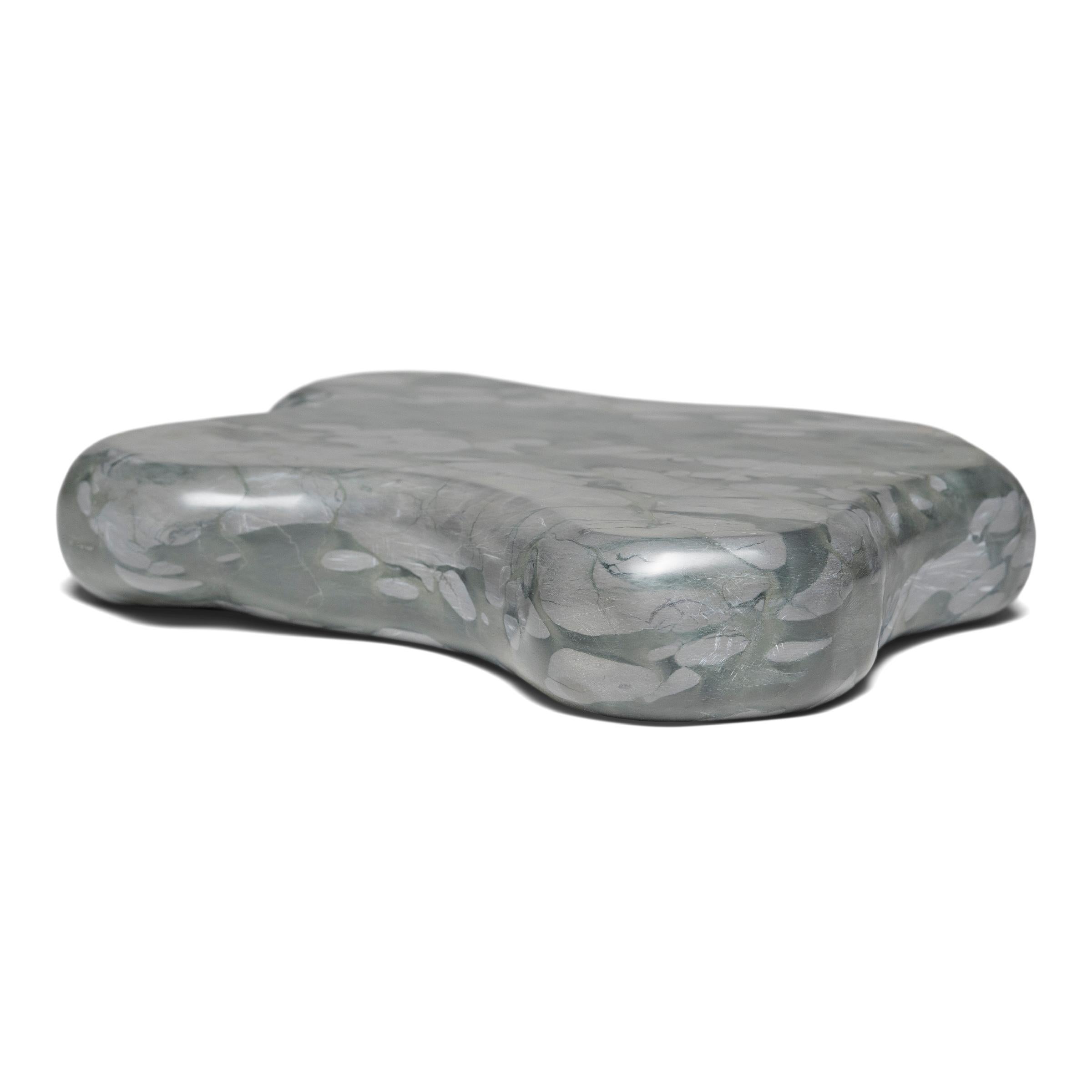 This small stone slab tray is formed of zhenzhu stone, a conglomerate limestone extracted from Lake Tai in China's Jiangsu province. Speckled with painterly daubs of color, the blue-grey puddingstone has been prized by scholars for centuries as a