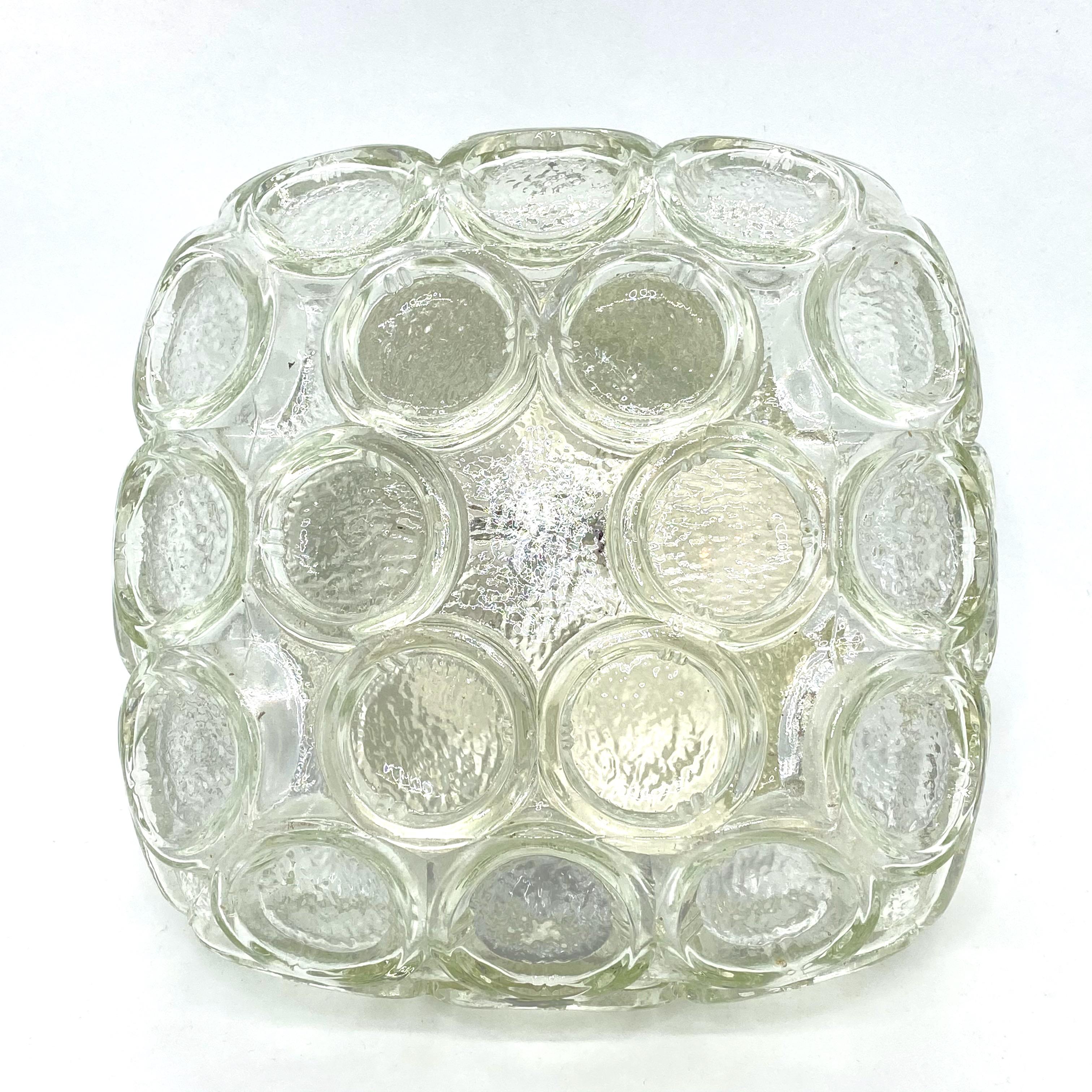 Petite circle pattern flush mount. Made in Germany by RZB Leuchten. Gorgeous textured glass flush mount with metal fixture. The fixture requires one European E14 candelabra bulb up to 60 watts.