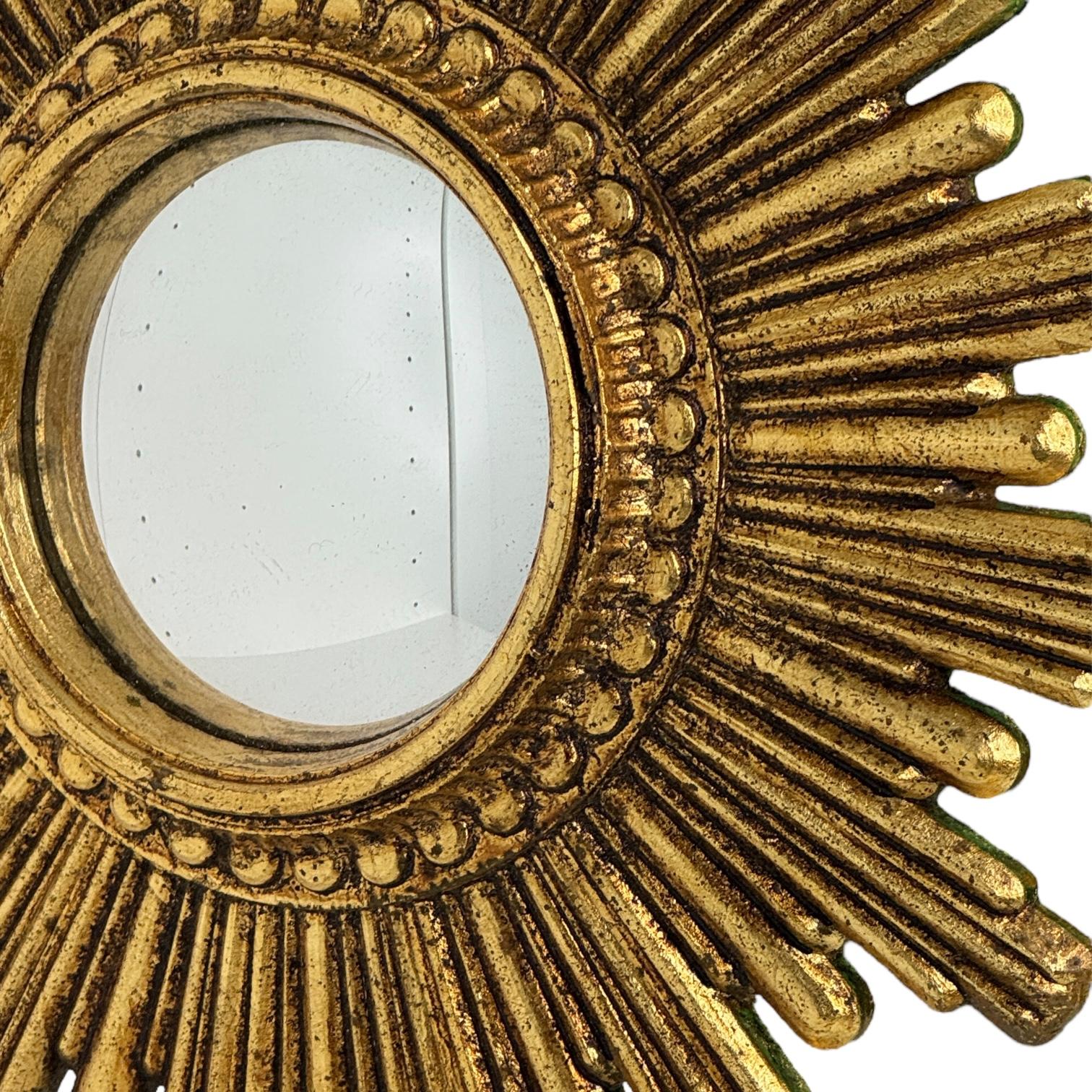 Hollywood Regency Petite Cute Starburst Sunburst Gilded Resin Convex Mirror Belgium, circa 1970s For Sale