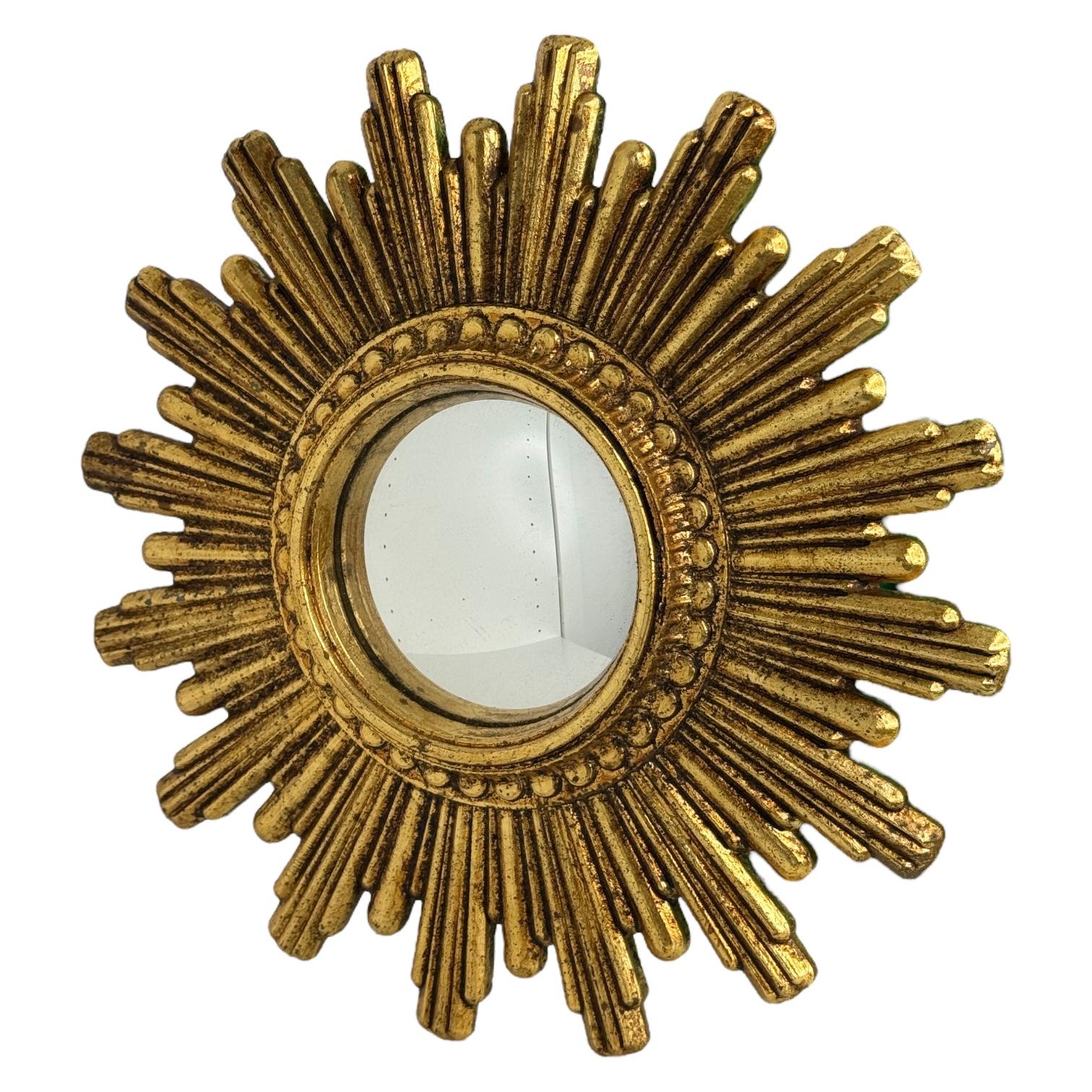 Gilt Petite Cute Starburst Sunburst Gilded Resin Convex Mirror Belgium, circa 1970s For Sale