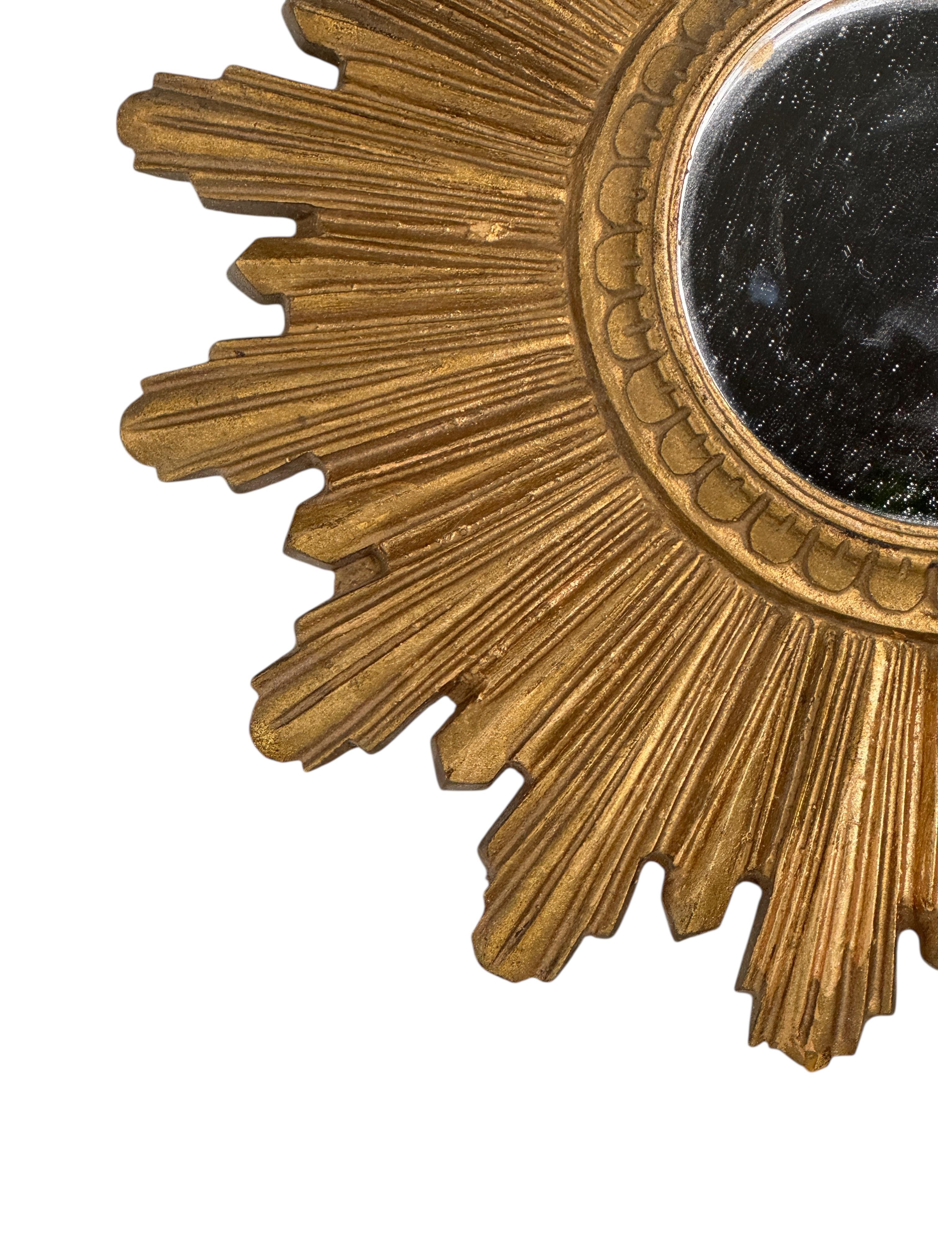 Hollywood Regency Petite Cute Starburst Sunburst Gilded Resin Flat Mirror Germany, circa 1970s For Sale