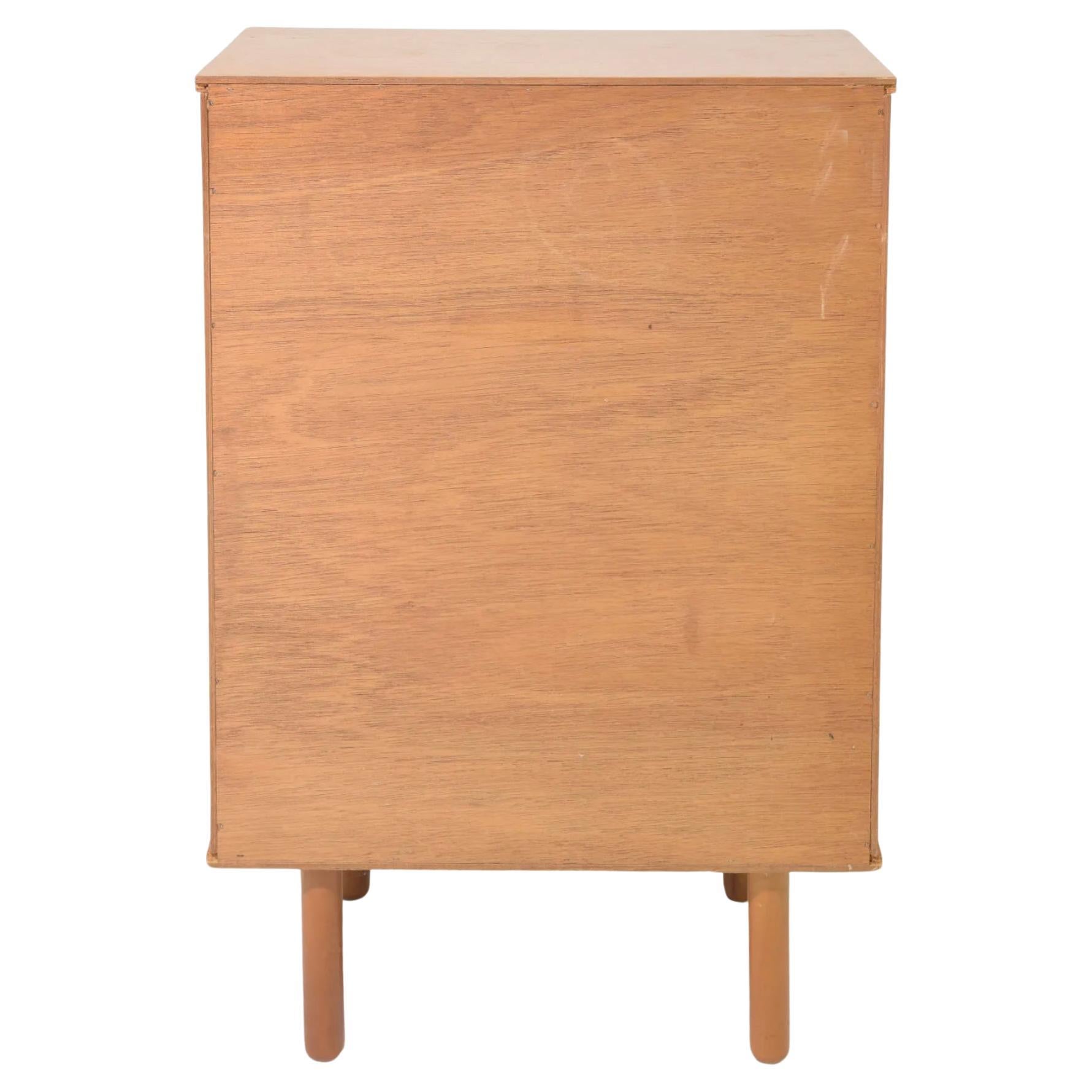Scandinavian Modern Petite Danish modern teak 5 drawer narrow dresser with teak round knobs  For Sale