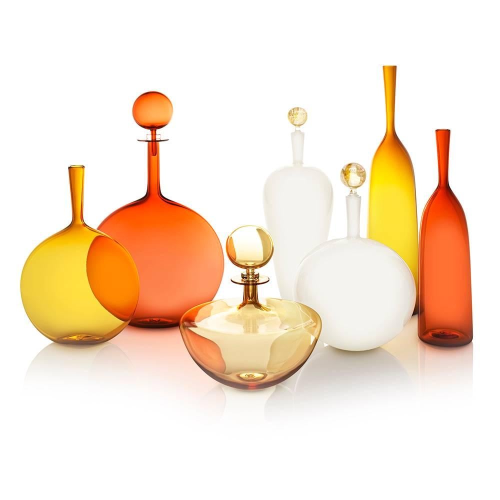 The petite decanter low arc is a perfect conversation piece and an excellent starting point to begin your collection. Pairs well with other large or petite decanters, or mix in with a group of Angelic bottles to create a strong statement. Each