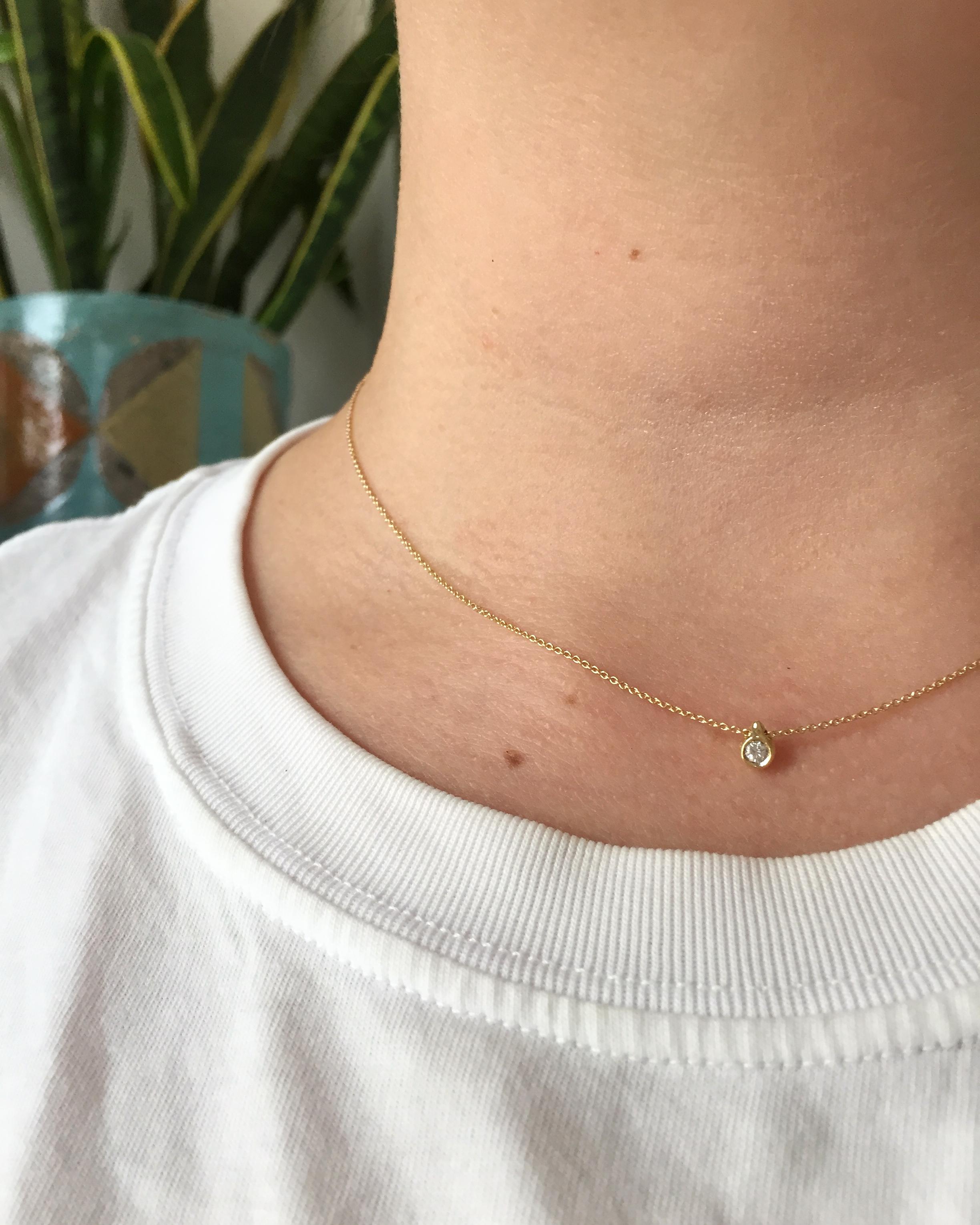 Round Cut Petite Diamond and Gold Necklace For Sale