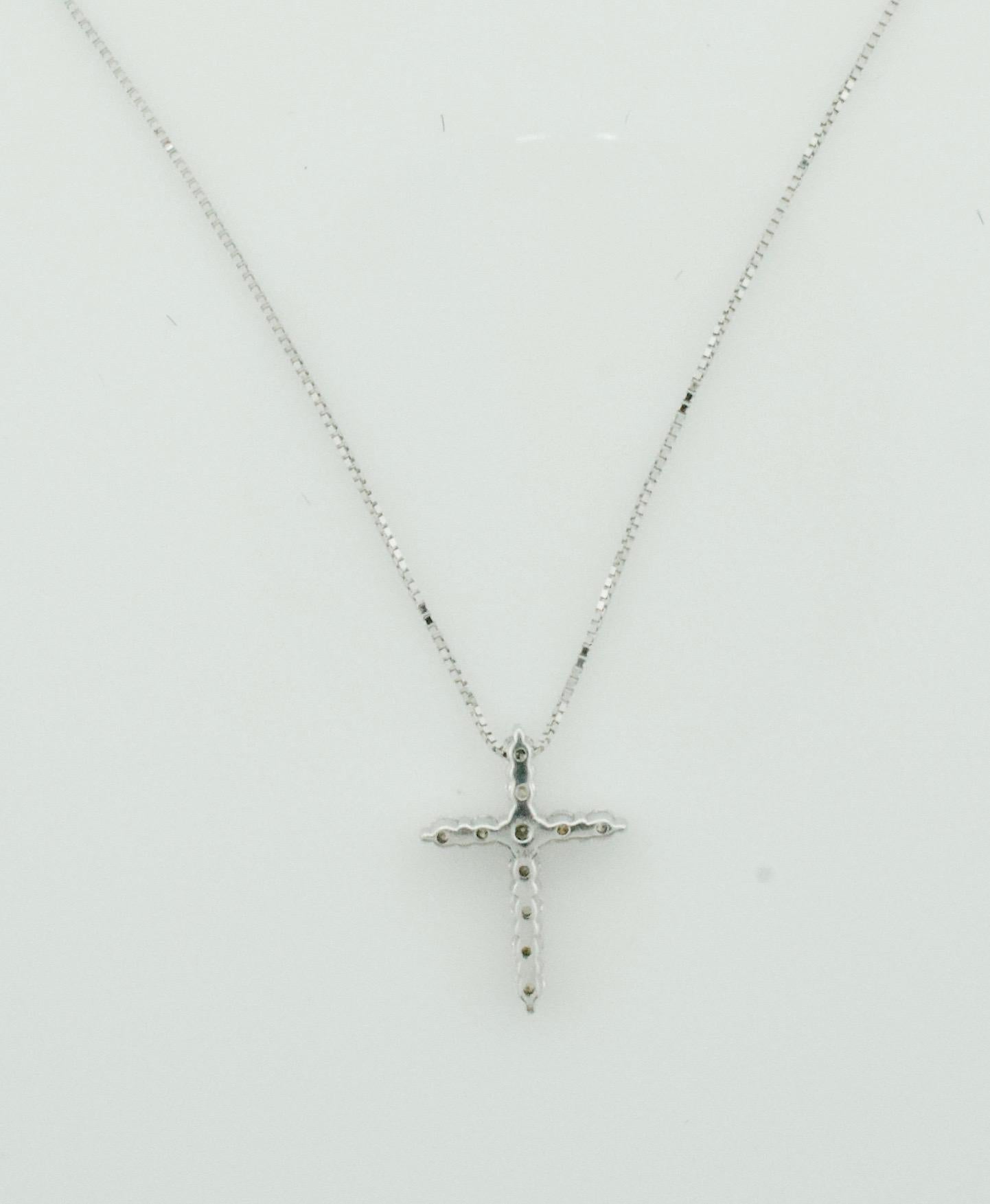 Round Cut Petite Diamond Cross in White Gold on Chain For Sale
