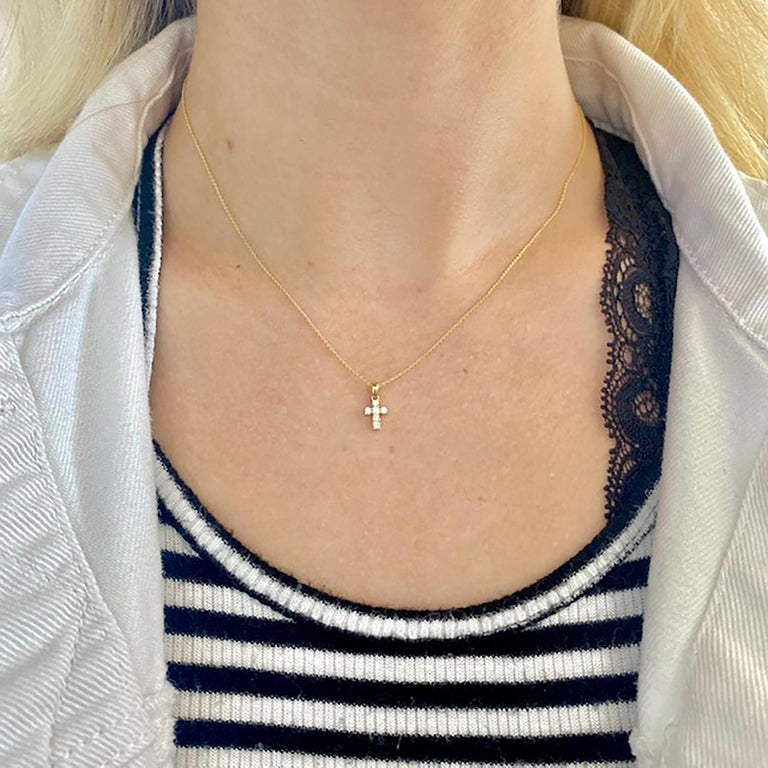 When you want a baby diamond necklace-this is the perfect one! Worn by babies, children, teenagers and small persons it is the perfect minimalist, genuine diamond necklace. Only 12 millimeters in length with six bright diamonds in solid 14 karat