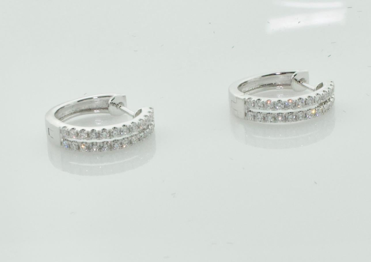 Petite Diamond Hoop Earrings in White Gold
48 Round Brilliant Cut Diamonds Weighing .45 Carats Approximately [GHVVS]