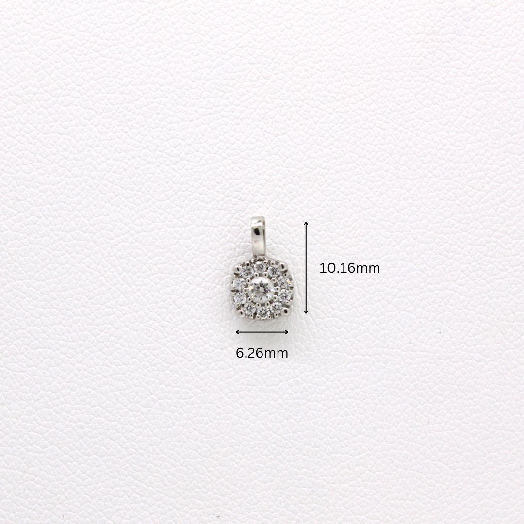 Total diamond weight: 0.22ct (VVS-VS. quality, G+ colour)
Total weight 0.45g
Material: 18K white gold
Chain available upon request.

Introducing our Petite Diamond Pendant, a captivating piece designed to add a touch of elegance to any ensemble.