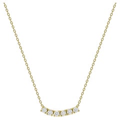Collier courbe à six pierres et petits diamants