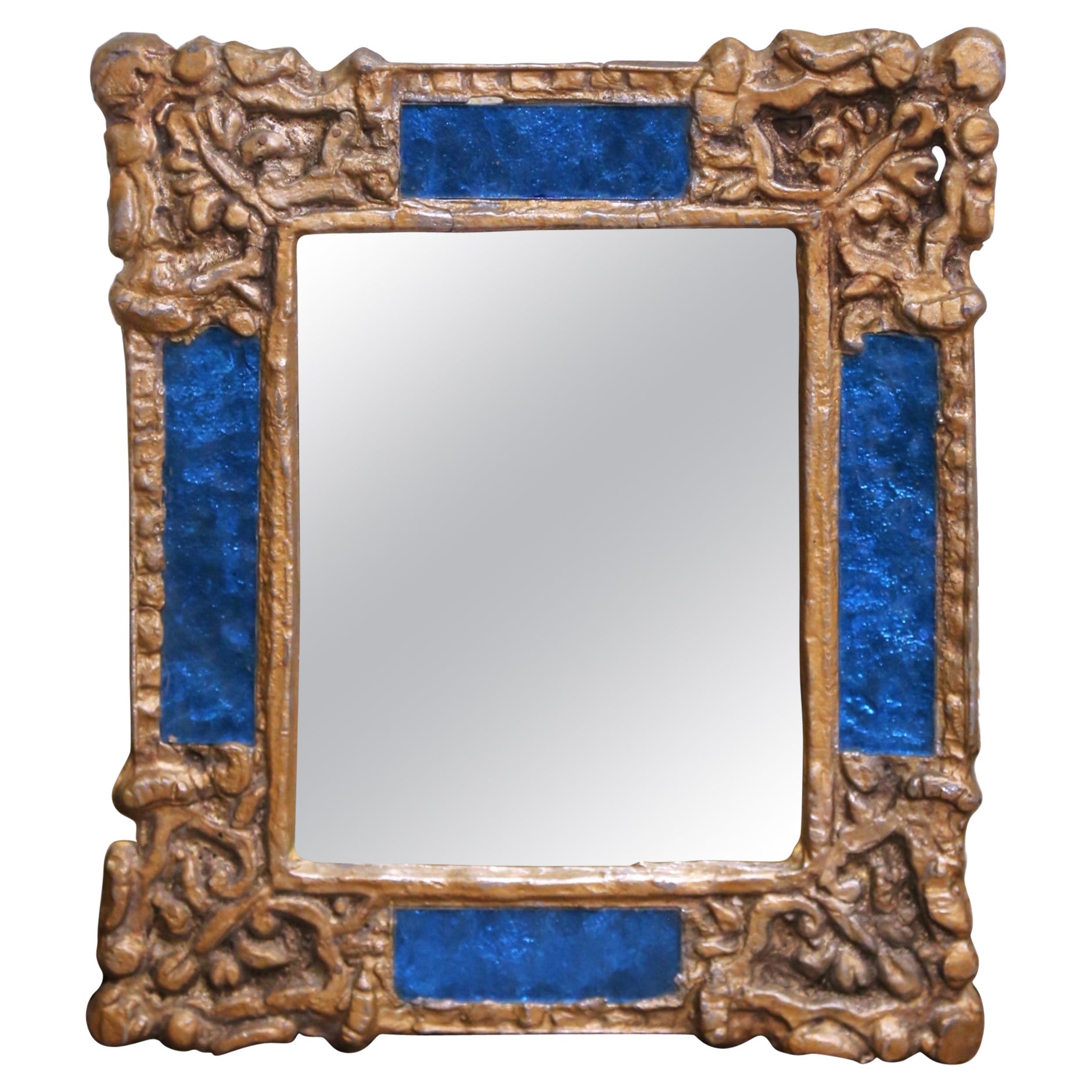 Petit miroir à soleil en fer doré espagnol du début du 20e C. avec incrustation de verre bleu