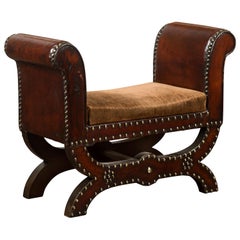 Petite English 1920s X-Form Leather Stool with Out-Scrolling Arms and Nailheads