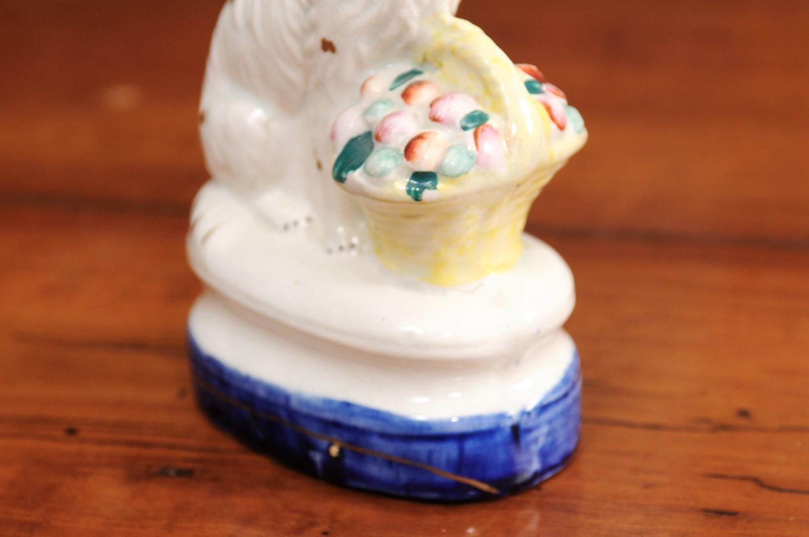 Petite English Michael Davis Porcelain Dog with Fruit Basket and Blue Oval Base For Sale 1