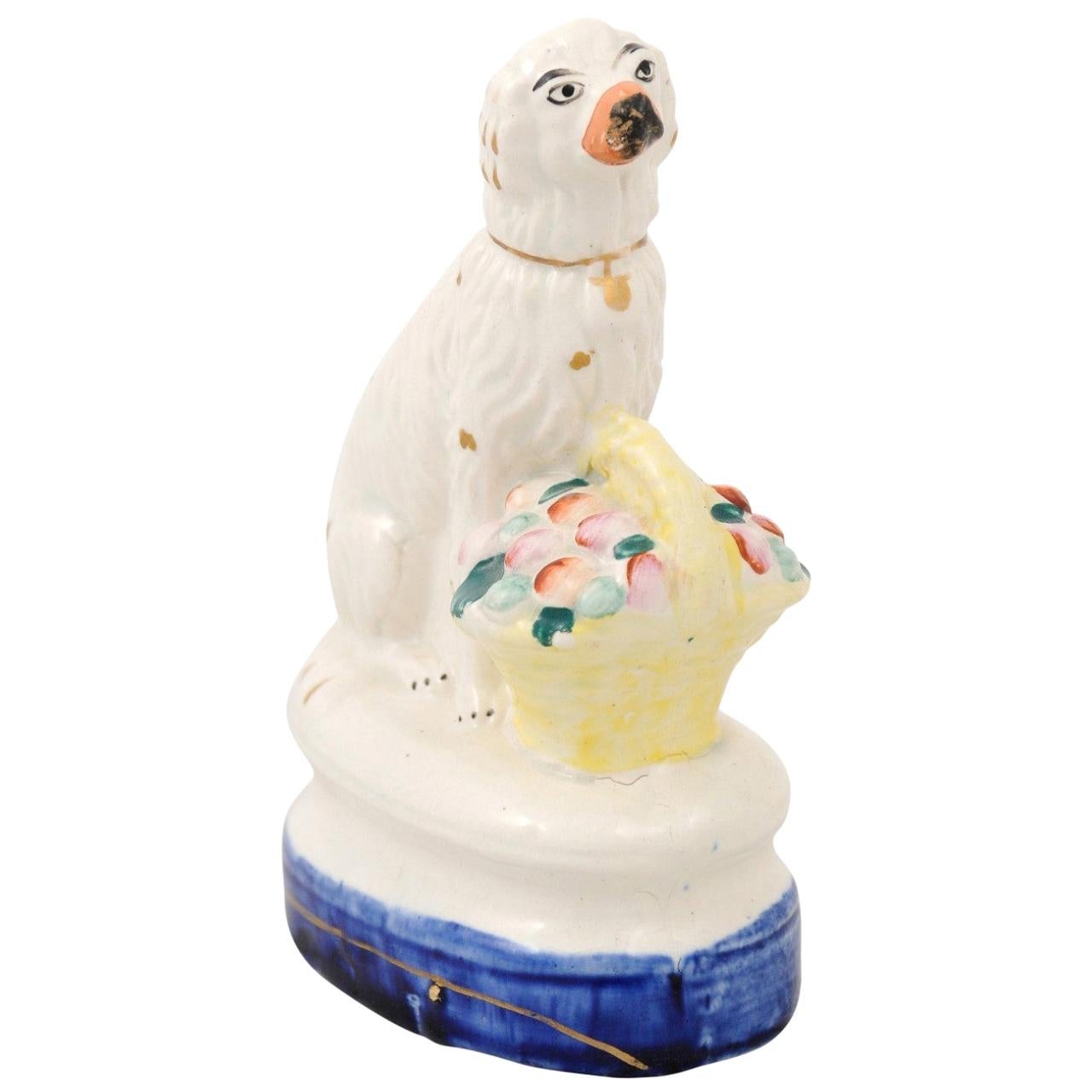 Petite English Michael Davis Porcelain Dog with Fruit Basket and Blue Oval Base For Sale