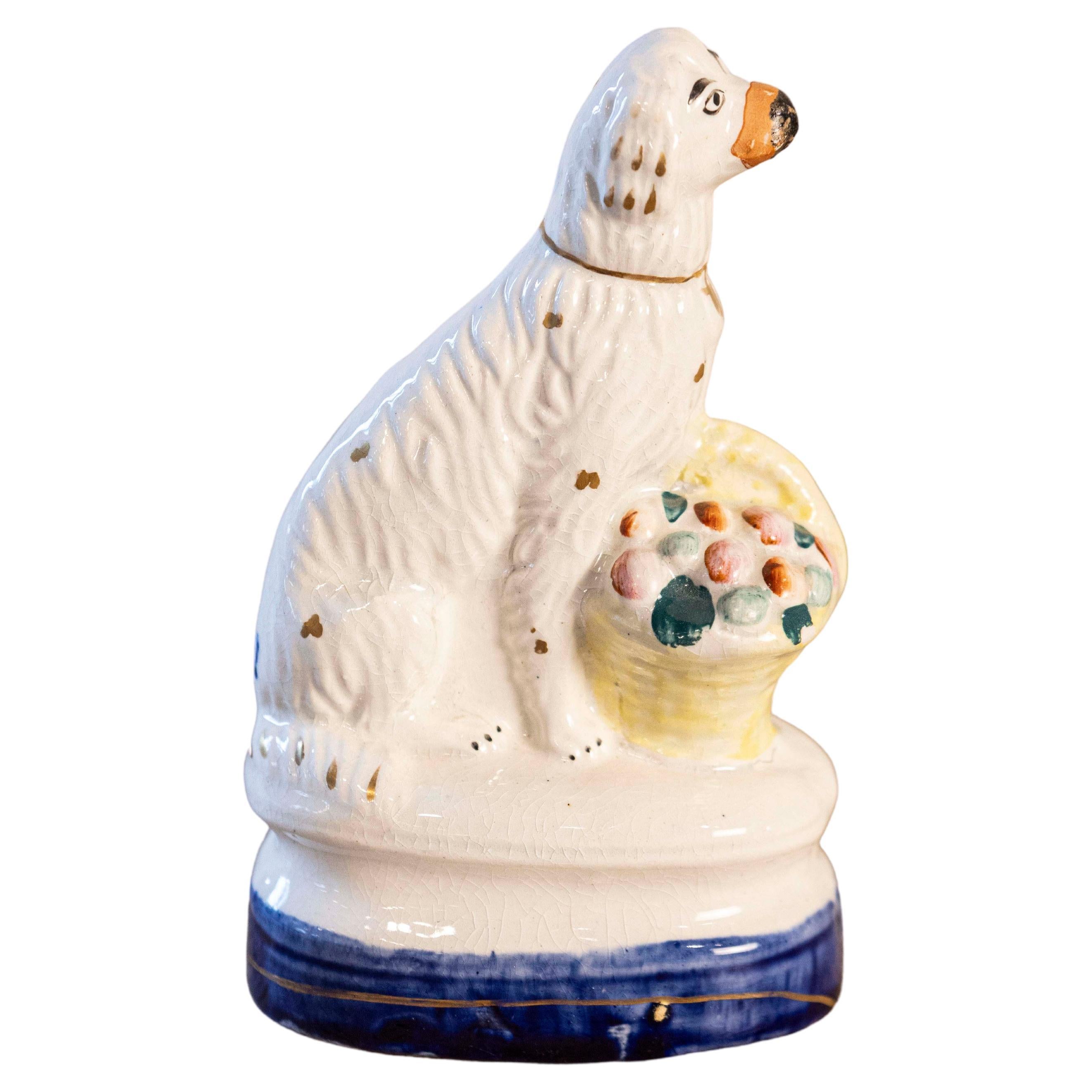 Petite English Michael Davis Porcelain Dog with Fruit Basket and Blue Oval Base