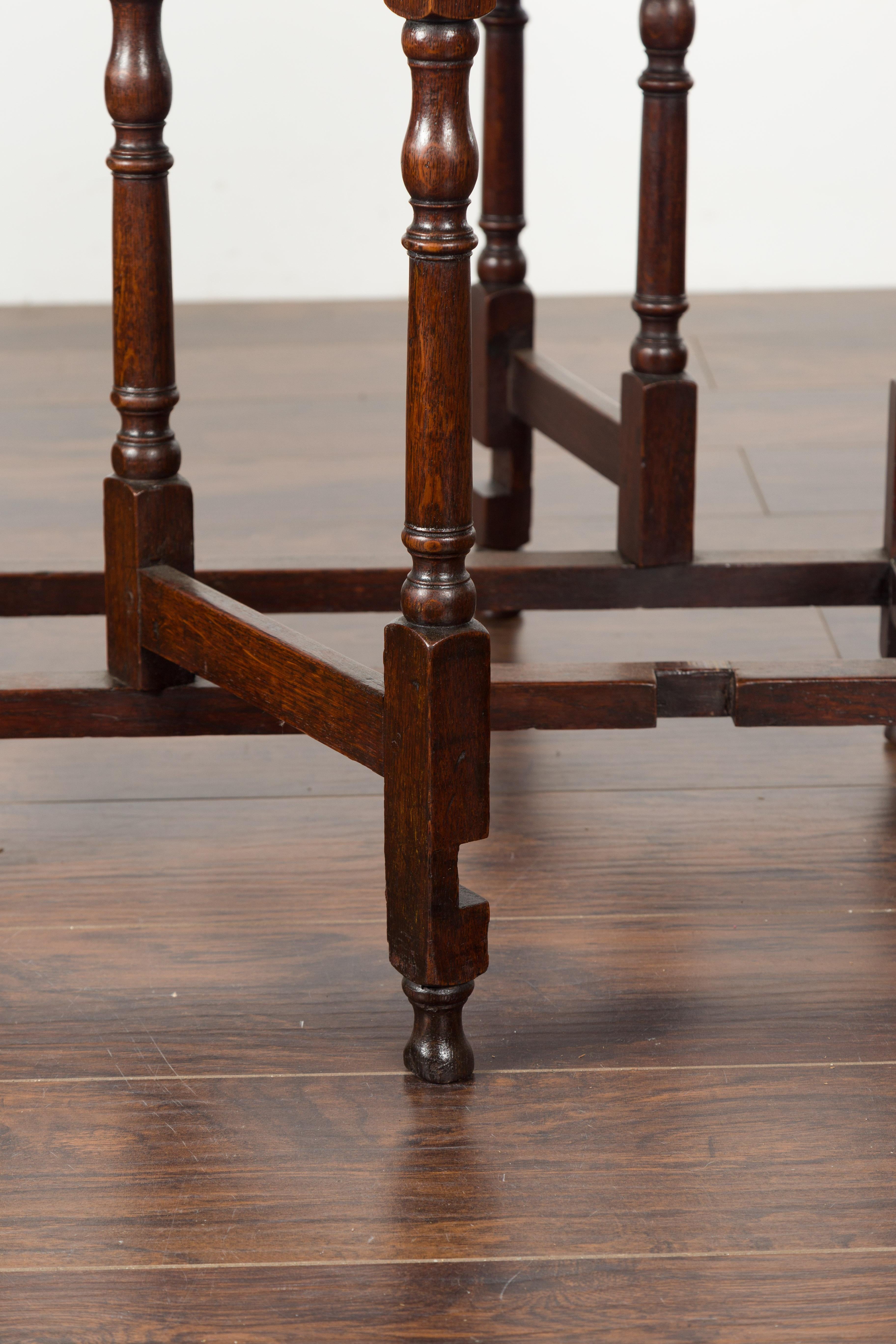 Petite English Oval Oak 19th Century Drop-Leaf Table with Baluster Legs For Sale 11