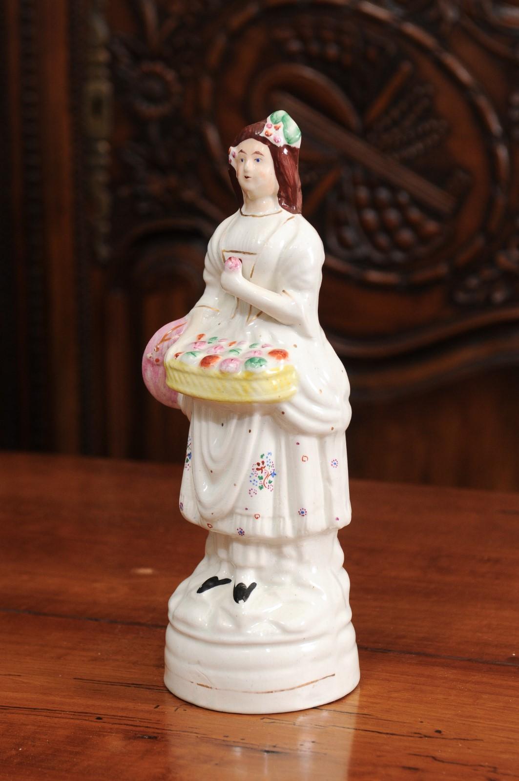 Petite English Porcelain Decorative Object Depicting a Lady with a Floral Basket For Sale 2