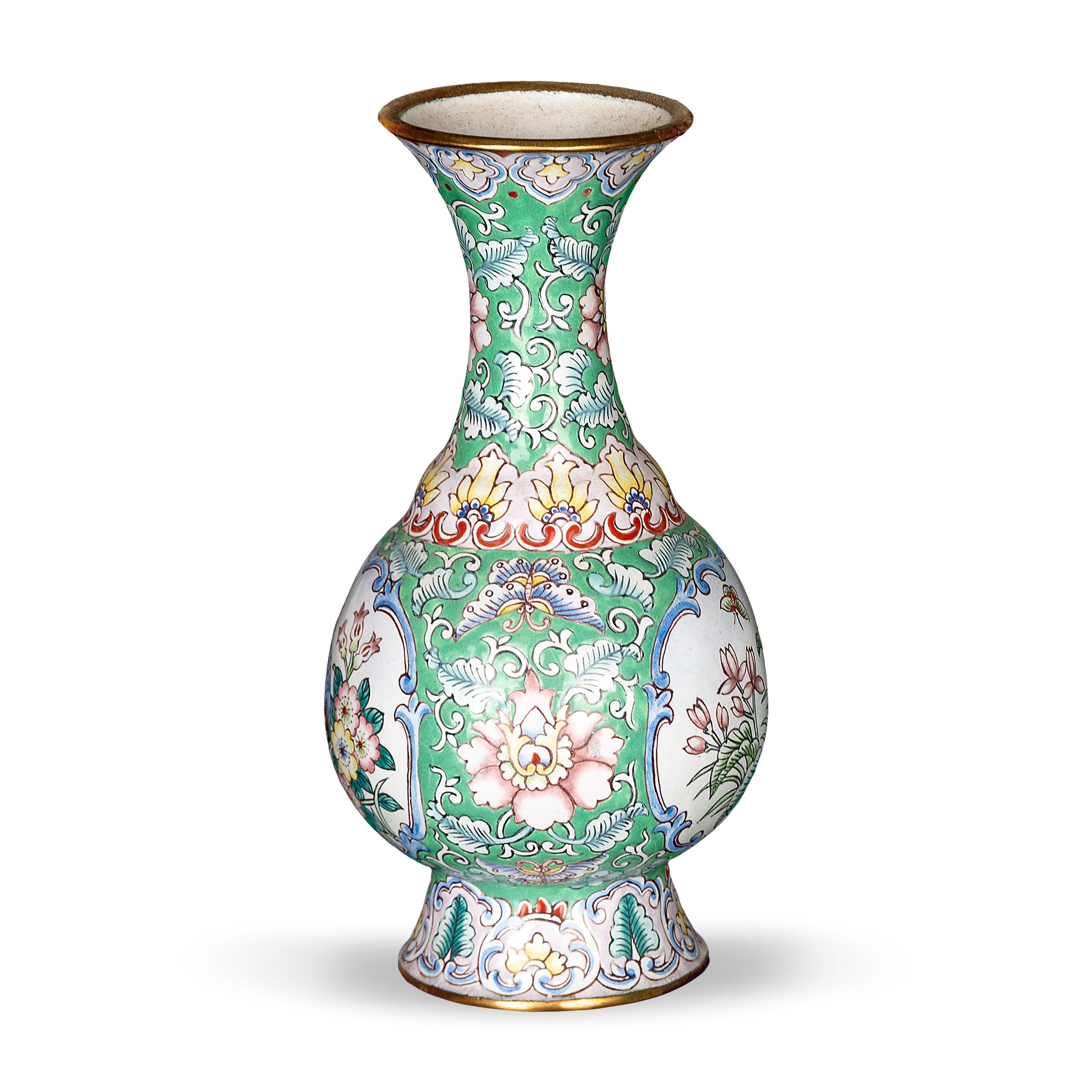 Dated to the 1920s during China's Republic Period, this petite vase is decorated in a style known as Canton enamel, so named for the long-standing industry of export enamels based in the port city of Guangzhou, formerly Canton. Formed of copper and