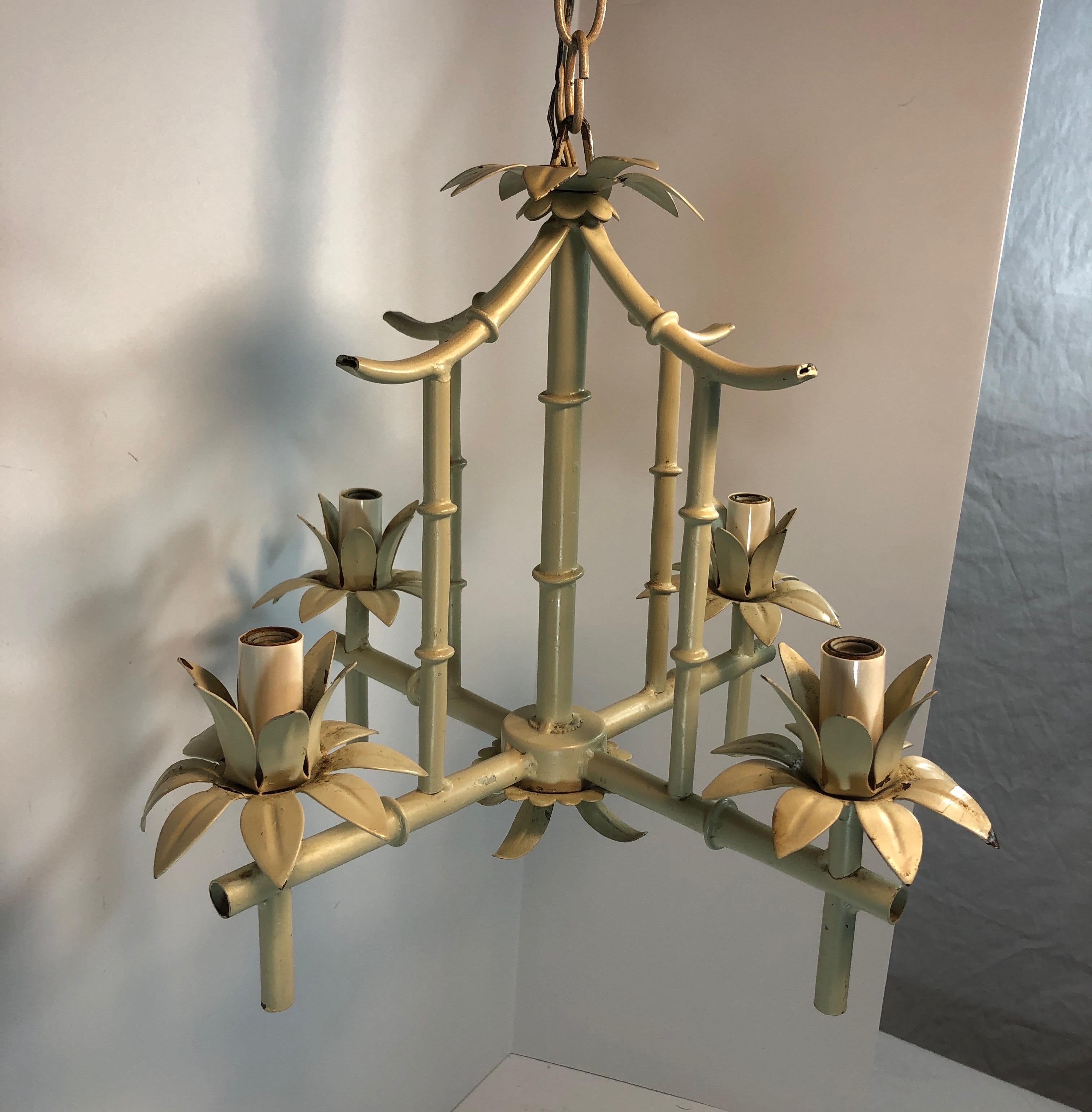 Petite faux bamboo chandelier with four arms in chippy beige paint. Italy tag. Height with out chain is 12