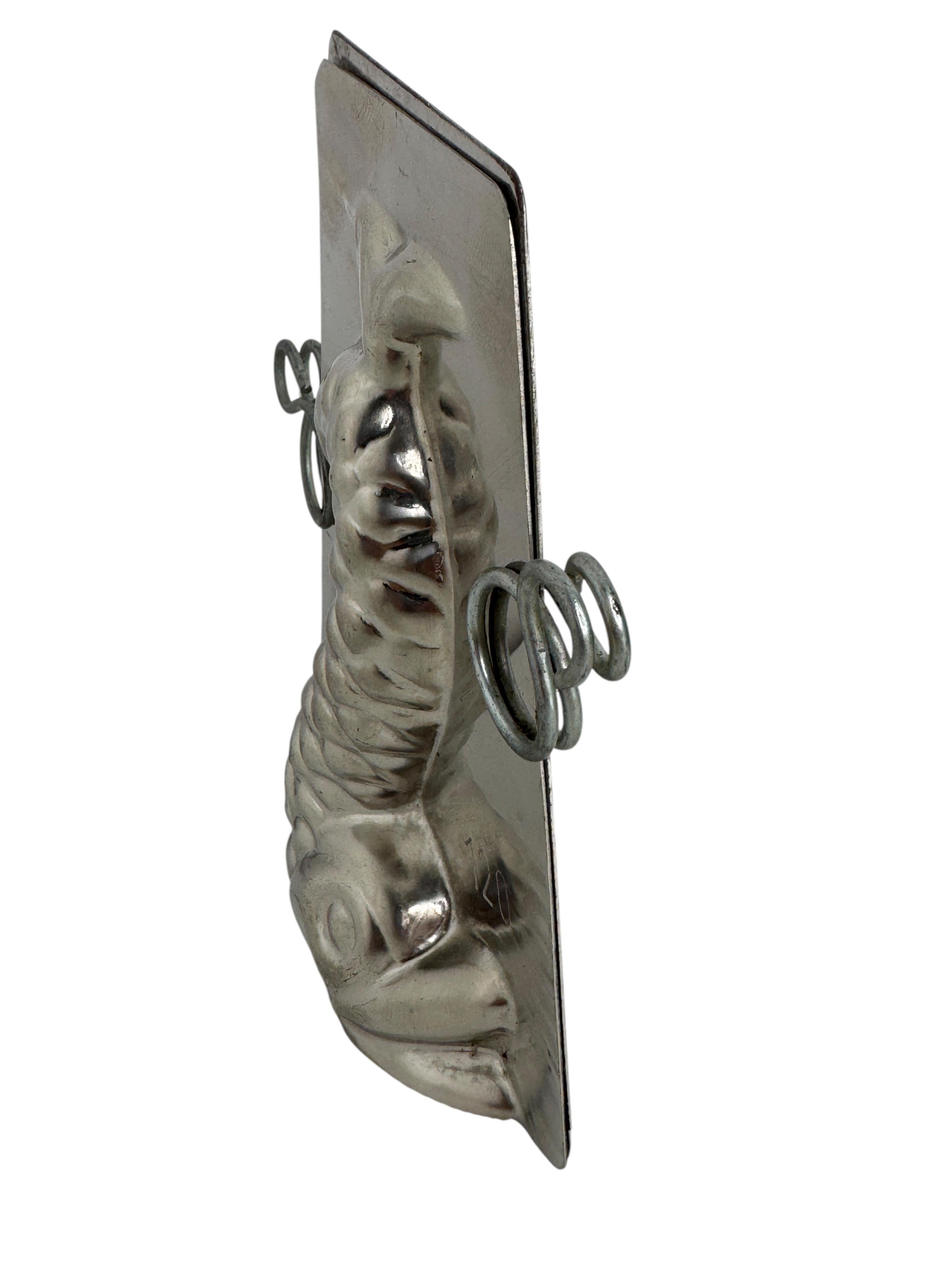 A gorgeous chocolate mold. Made of metal, only marked with a mold number. Beautiful and ready to use or display.
The 1890s to 1920s were the golden age of Chocolate production and consumption throughout Europe. Many cities and towns had competing