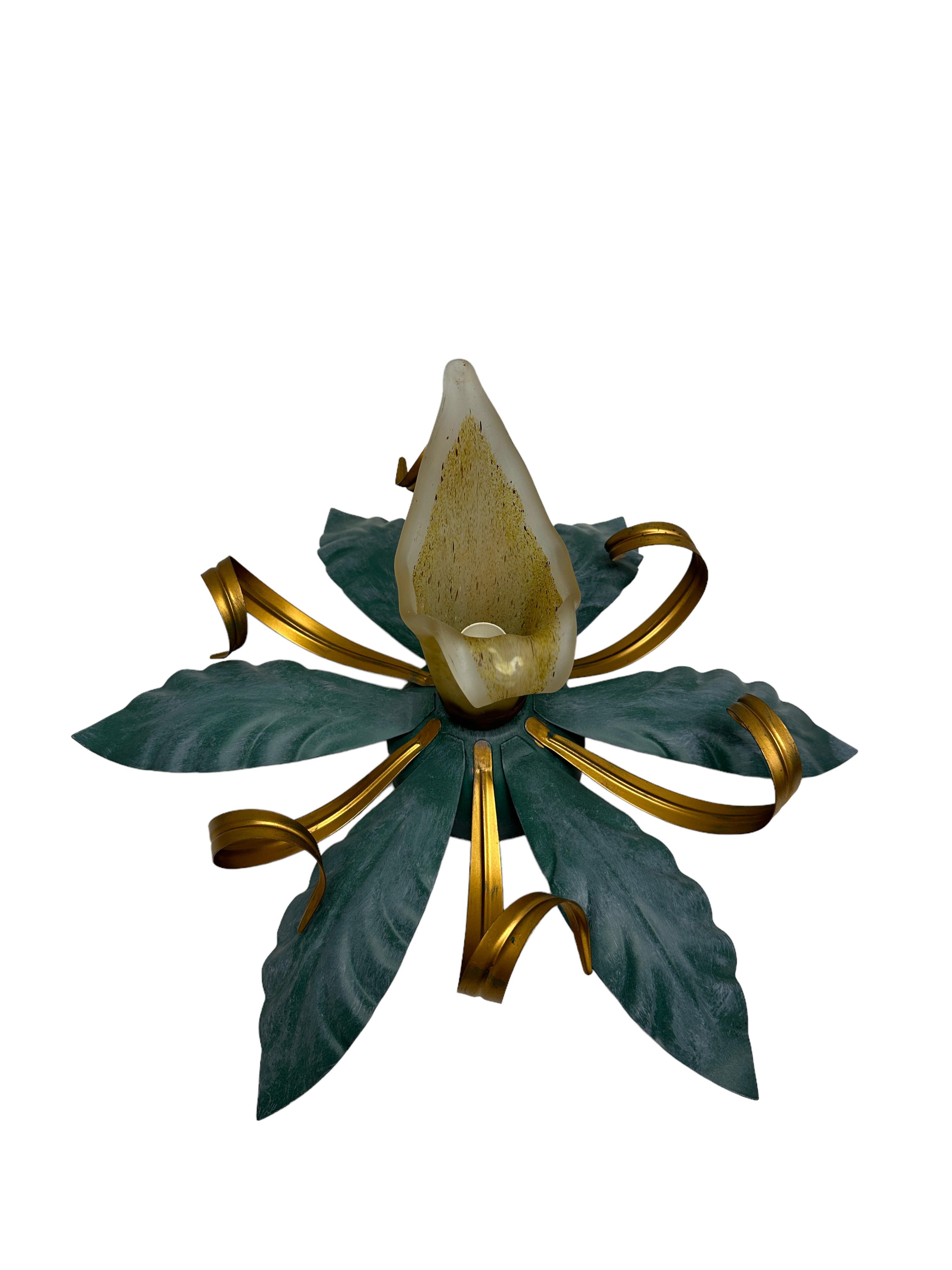 This floral Hollywood Regency or Florentine flush mount is decorated with glass Shades and metal leaves. Flower calyx made of heavy Murano Glass. The fixture requires one European E14 / 110 Volt candelabra bulb, up to 40 watts. This light fixture