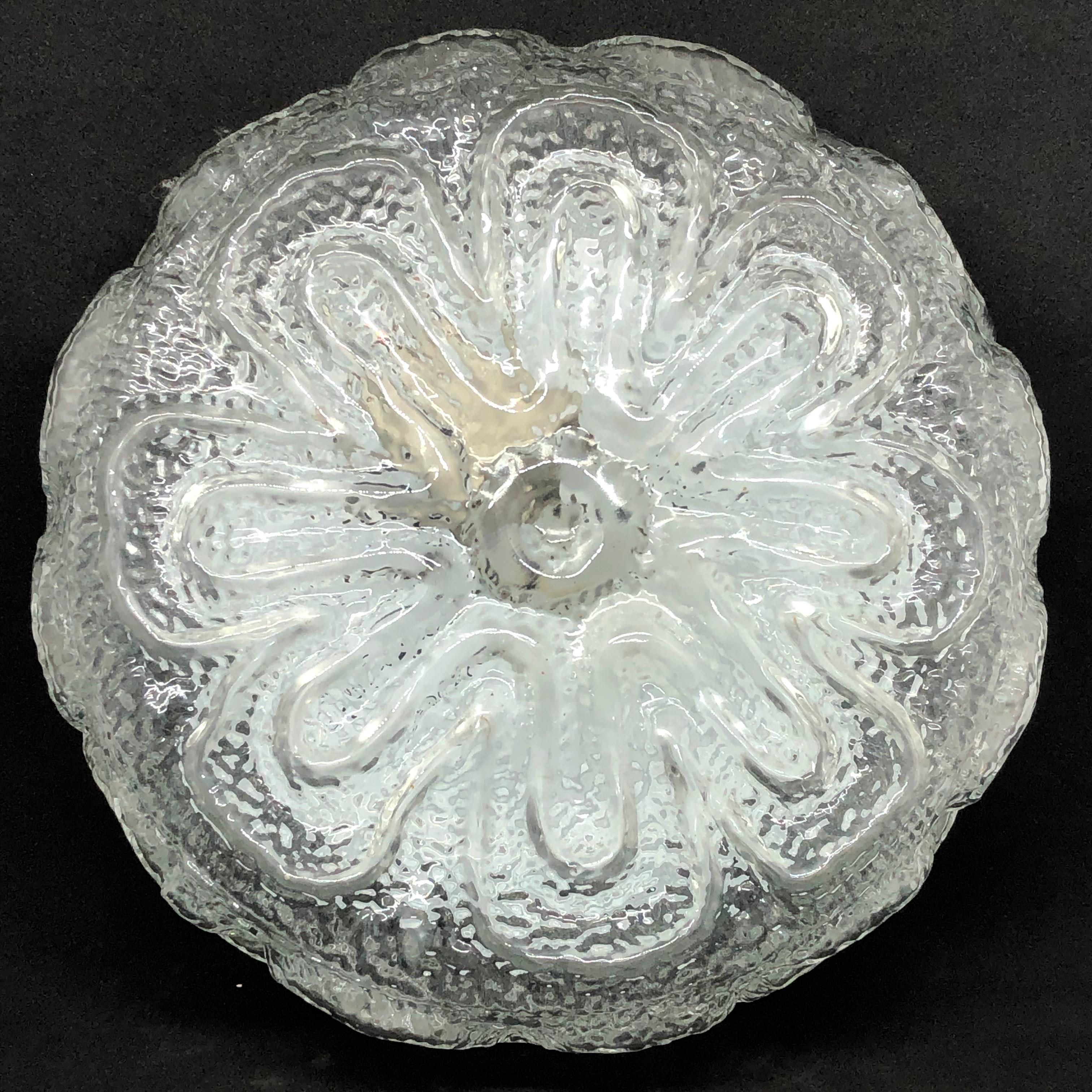 Petite flower pattern flush mount. Gorgeous textured glass flush mount with metal fixture. The fixture requires one European E27 Edison or Medium bulb up to 60 watts.